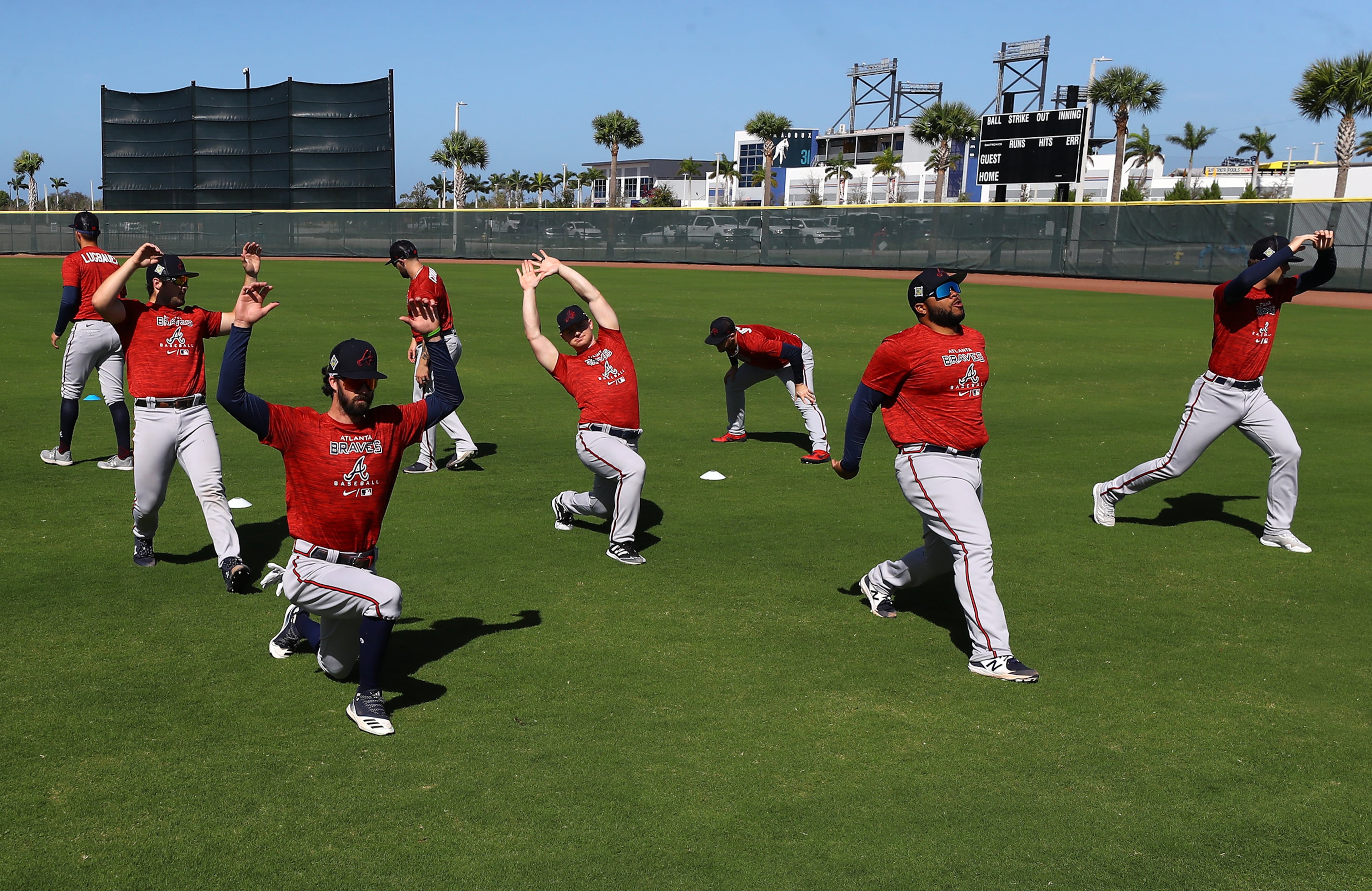 030622 North Port: Atlanta Braves minor league players loosen up on a practice field for the first day of Braves minor league spring training camp on Sunday, March 6, 2022, in North Port. “Curtis Compton / Curtis.Compton@ajc.com”`
