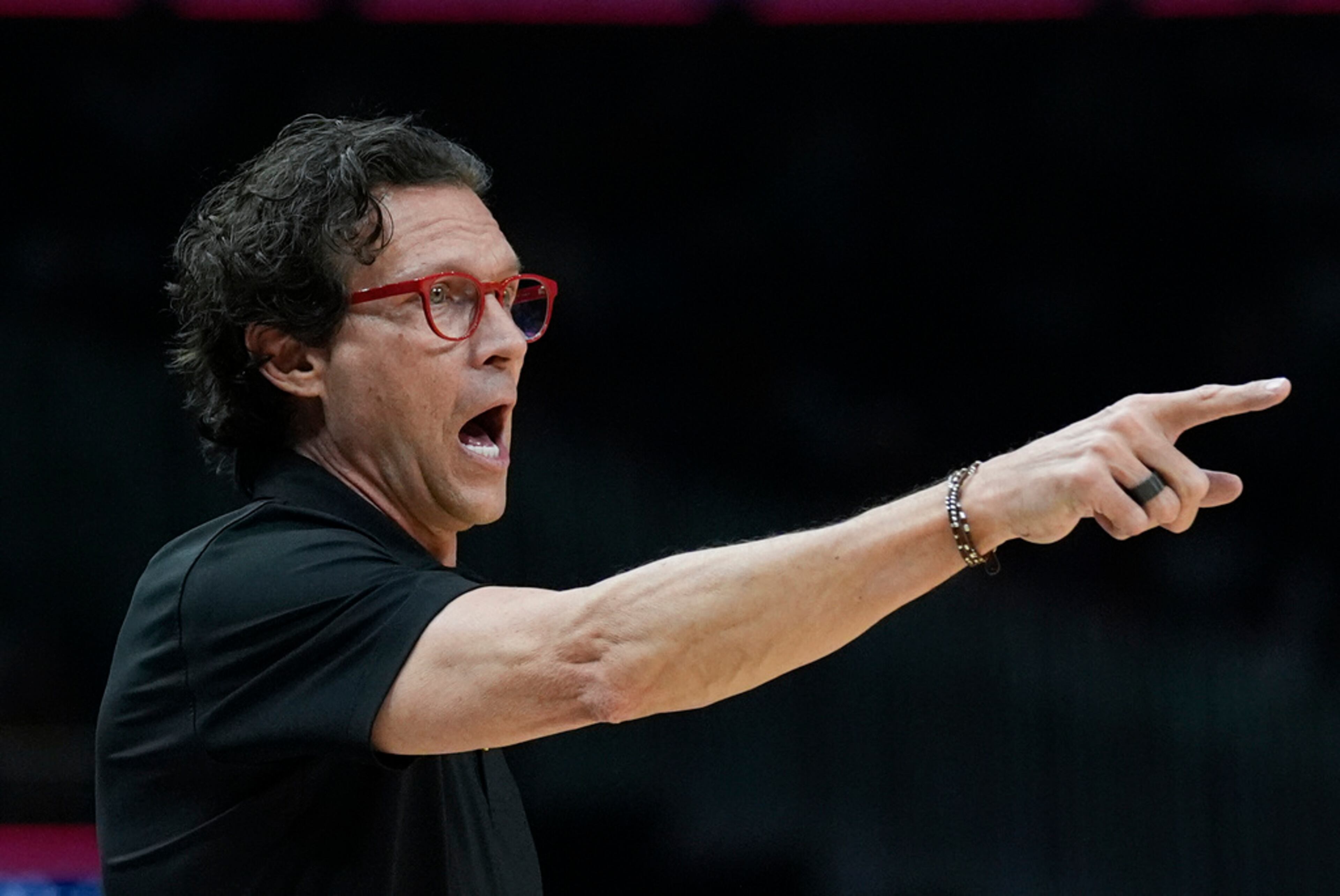Atlanta Hawks head coach Quin Snyder reacts on the sideline during the first half of an NBA basketball game against the Charlotte Hornets Saturday, March 23, 2024, in Atlanta. (AP Photo/John Bazemore)