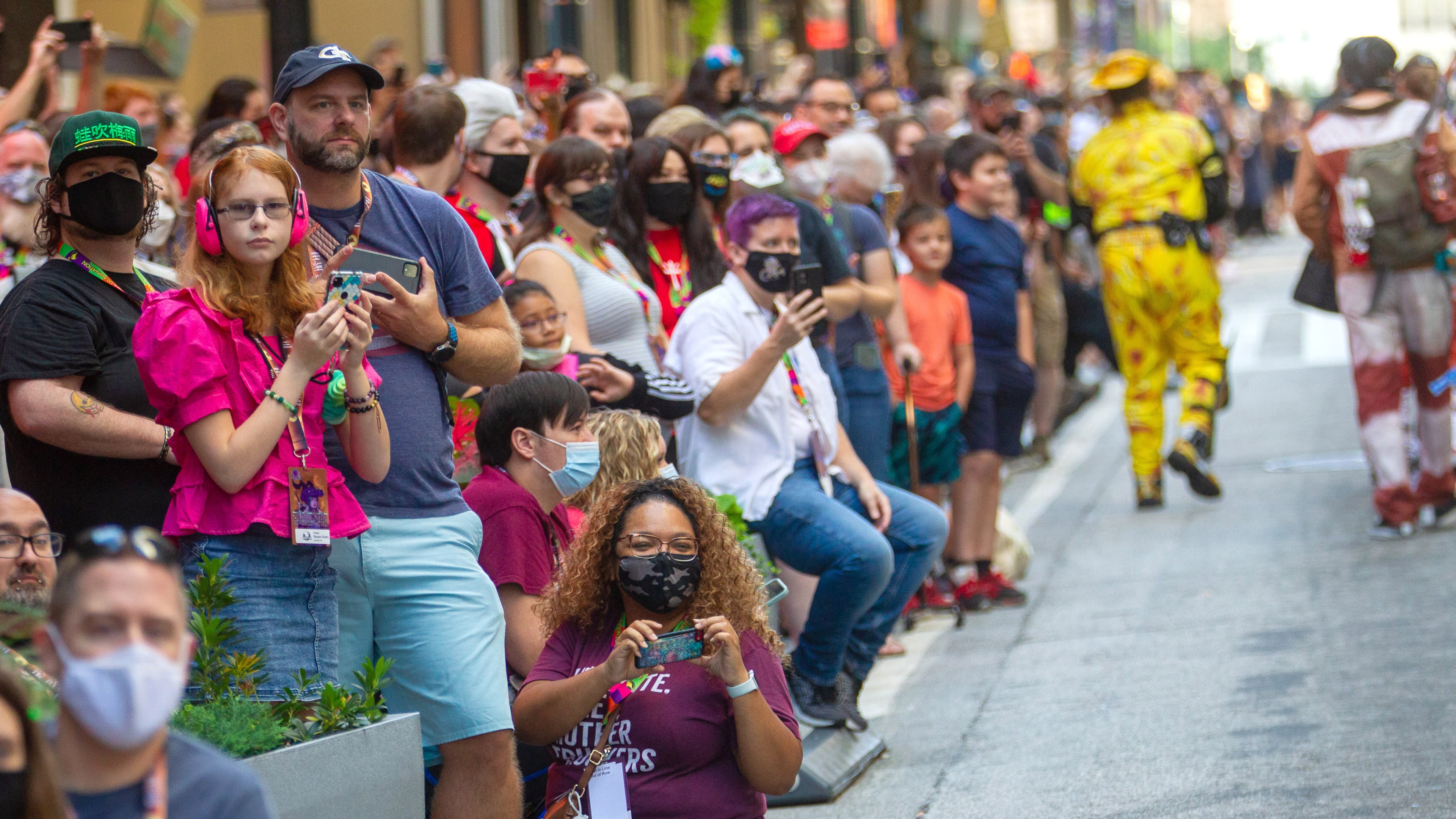 People line Peachtree Street to watch the Dragon Con Parade on Saturday, September 4, 2021, in Atlanta. STEVE SCHAEFER FOR THE ATLANTA JOURNAL-CONSTITUTION