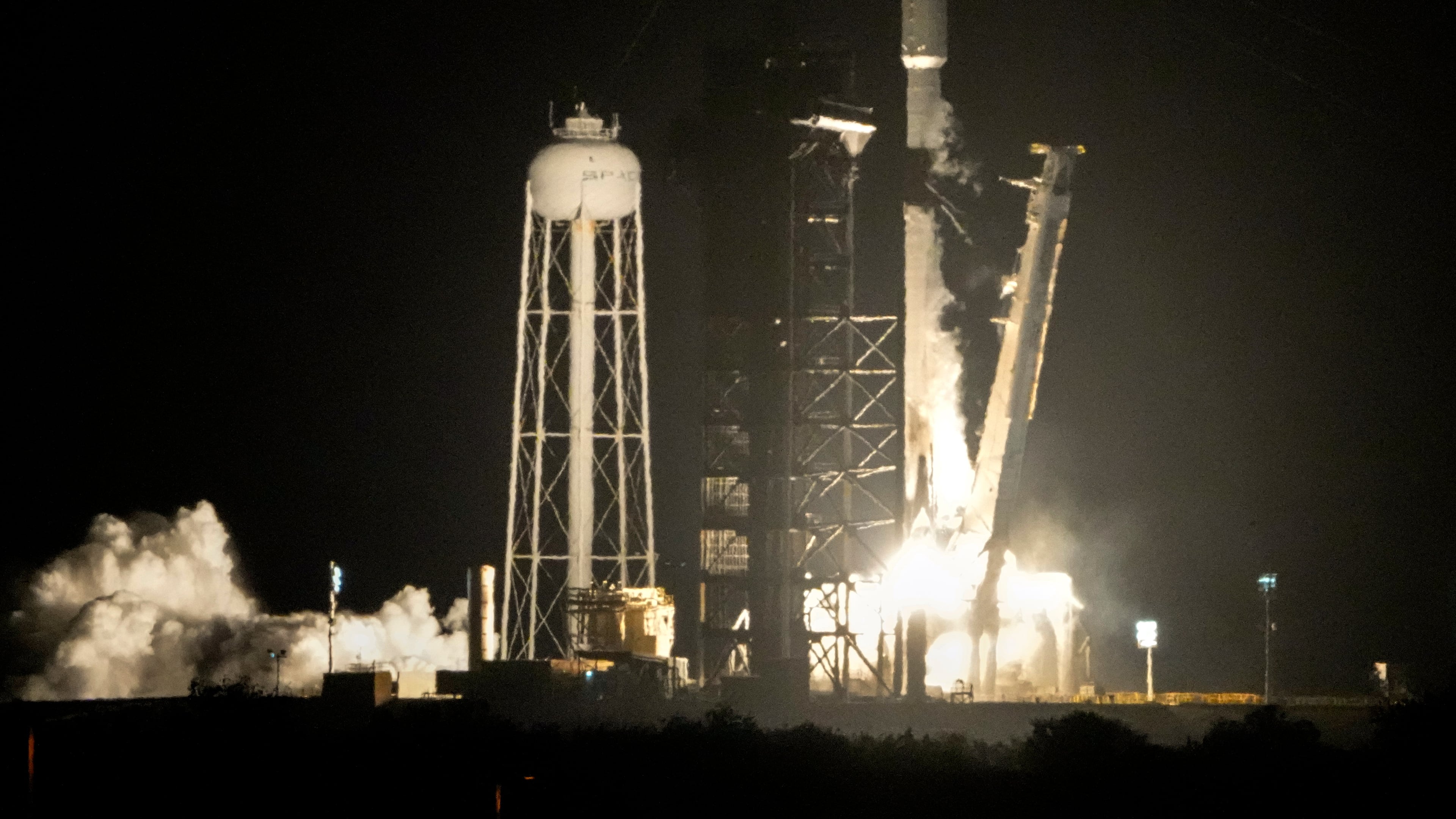 FILE - A SpaceX Falcon 9 rocket lifts off from pad 39A with a payload of a pair of lunar landers at the Kennedy Space Center in Cape Canaveral, Fla., Jan. 15, 2025. (AP Photo/John Raoux, File)