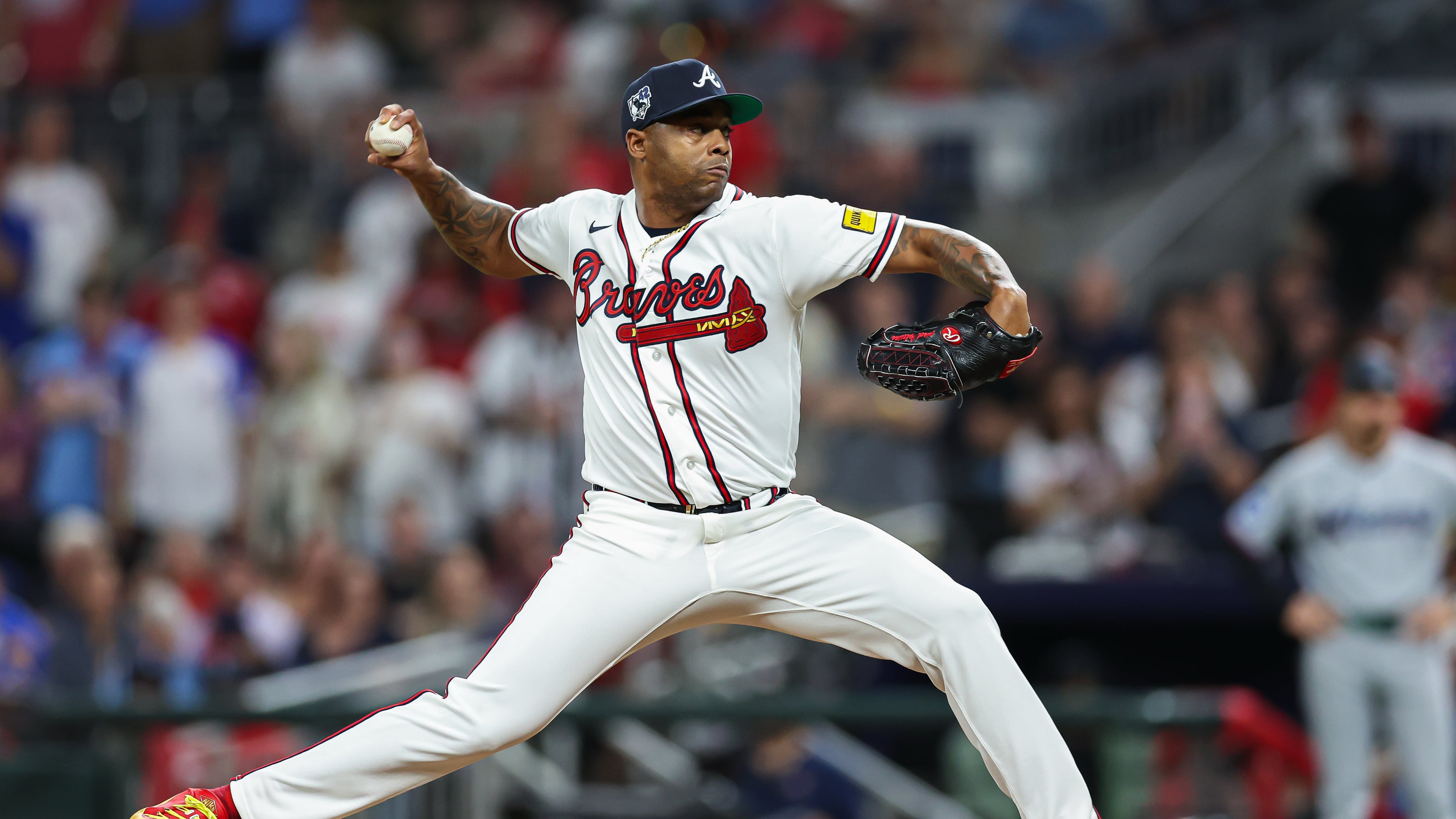 Atlanta Braves pitcher Raisel Iglesias delivers in the ninth inning of a baseball game against the Miami Marlins, Wednesday, April 15, 2026, in Atlanta. (AP Photo/Colin Hubbard)