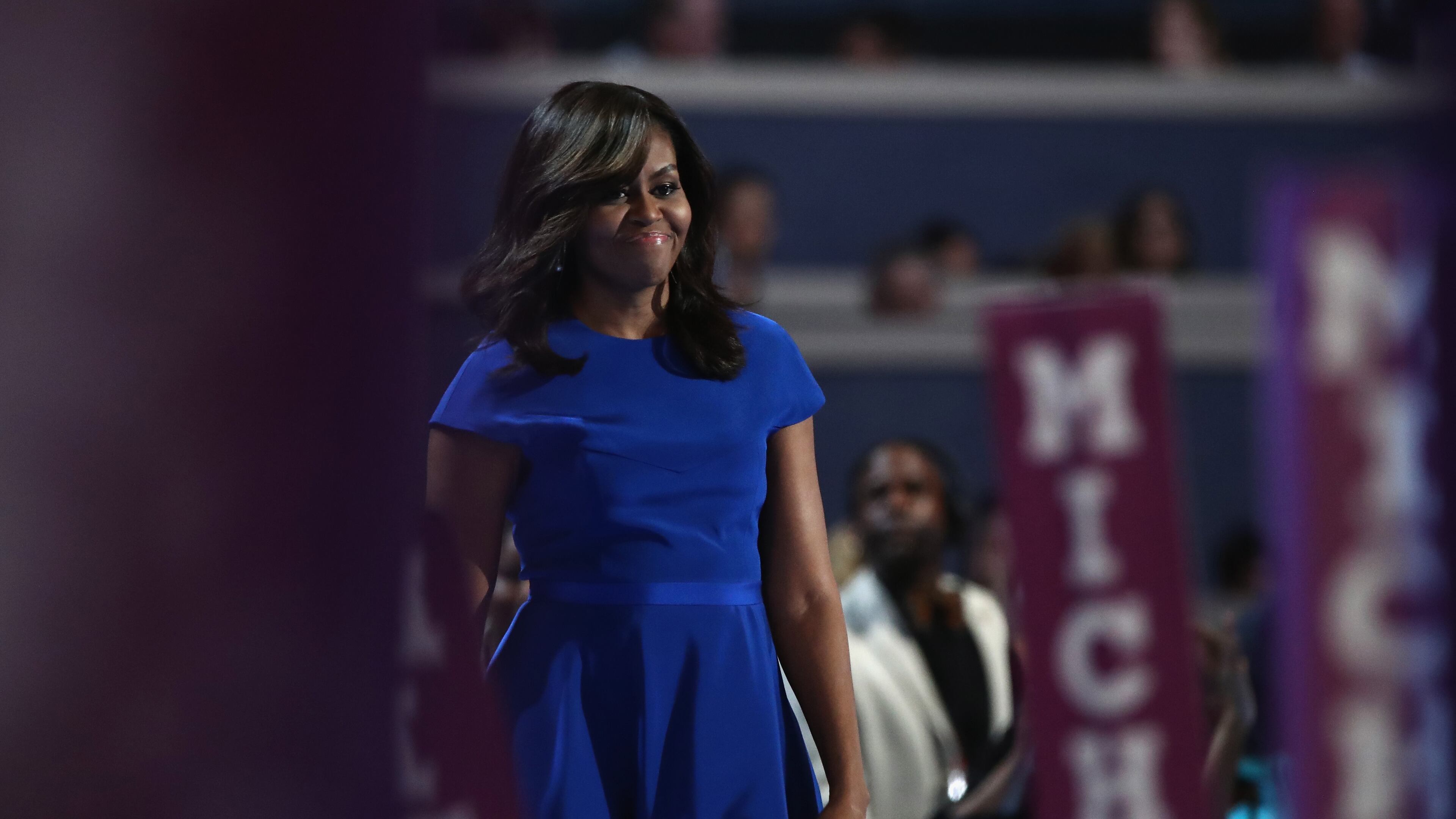 PHILADELPHIA, PA - JULY 25: First lady Michelle Obama walks on stage before delivering remarks on the first day of the Democratic National Convention at the Wells Fargo Center, July 25, 2016 in Philadelphia, Pennsylvania. An estimated 50,000 people are expected in Philadelphia, including hundreds of protesters and members of the media. The four-day Democratic National Convention kicked off July 25. (Photo by Jessica Kourkounis/Getty Images)
