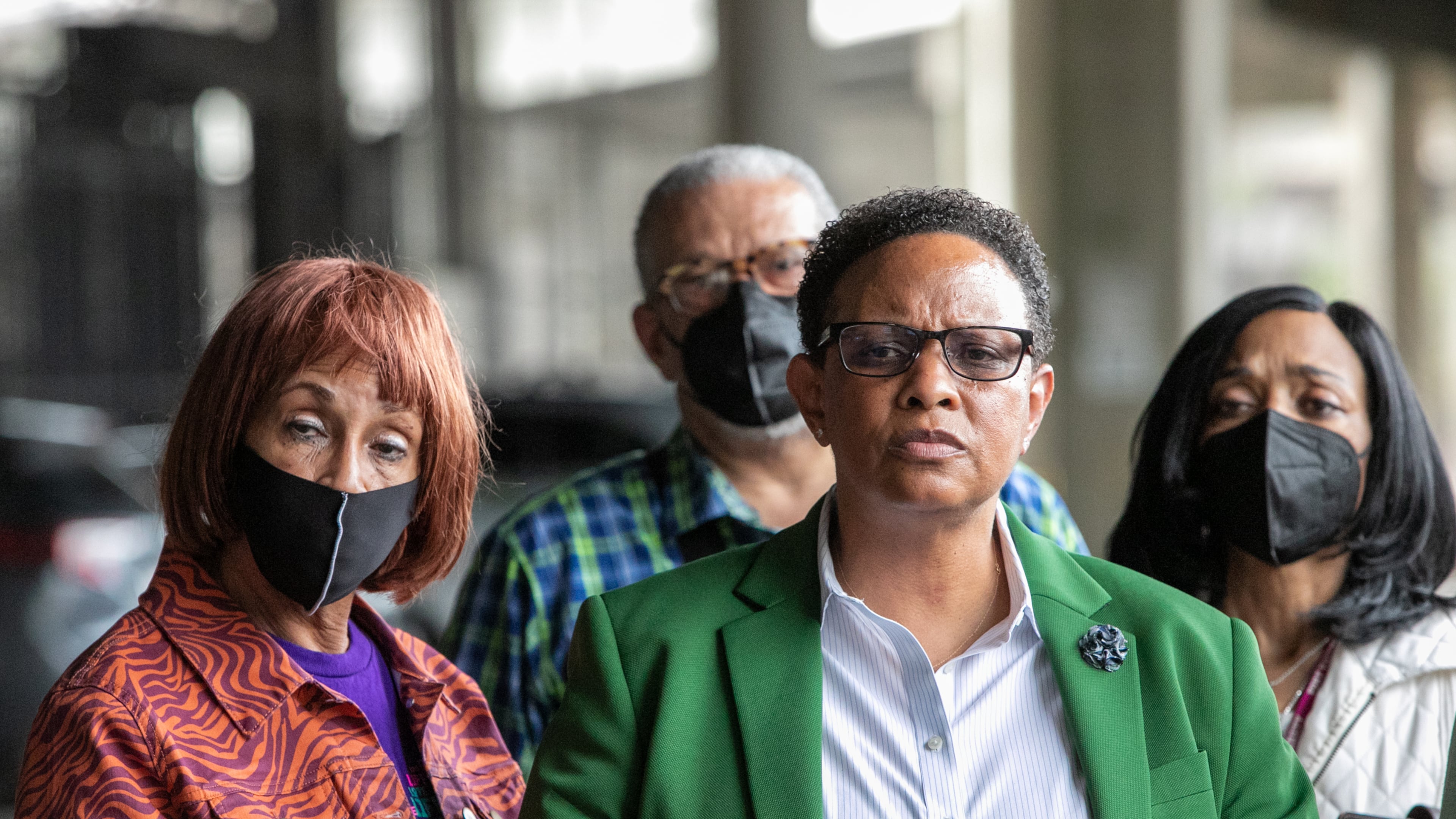 The 11th Circuit Court of Appeals on Wednesday denied a quest for a new trial for former Atlanta official Mitzi Bickers (pictured here in green blazer). (Jenni Girtman for The Atlanta Journal-Constitution)