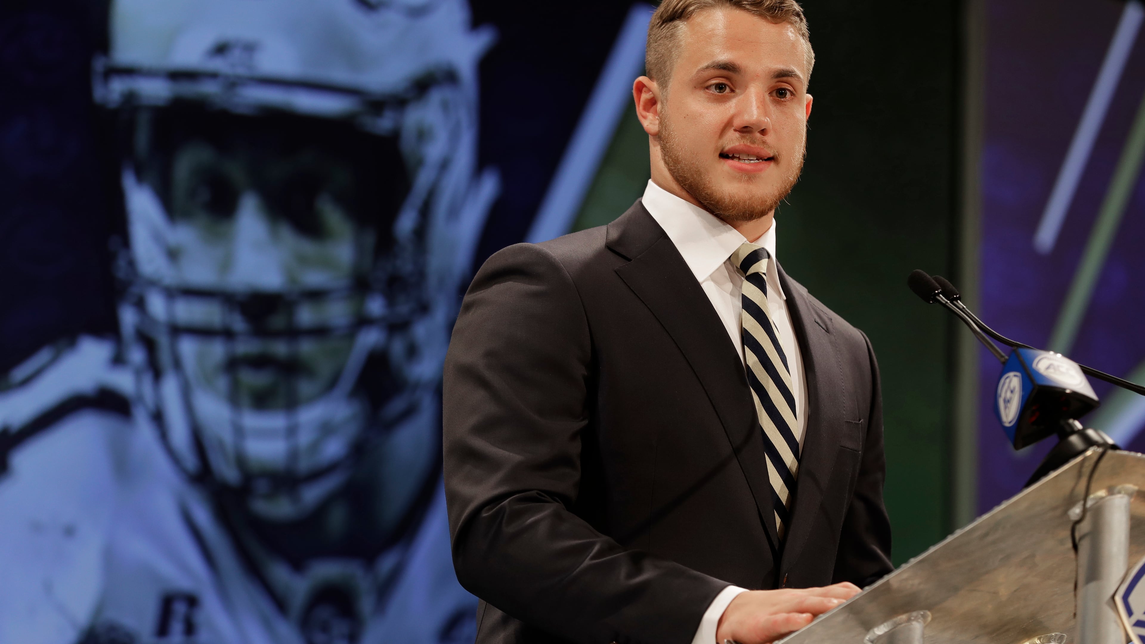Georgia Tech's Brant Mitchell answers a question during a news conference at the NCAA Atlantic Coast Conference college football media day in Charlotte, N.C., Wednesday, July 18, 2018. (AP Photo/Chuck Burton)