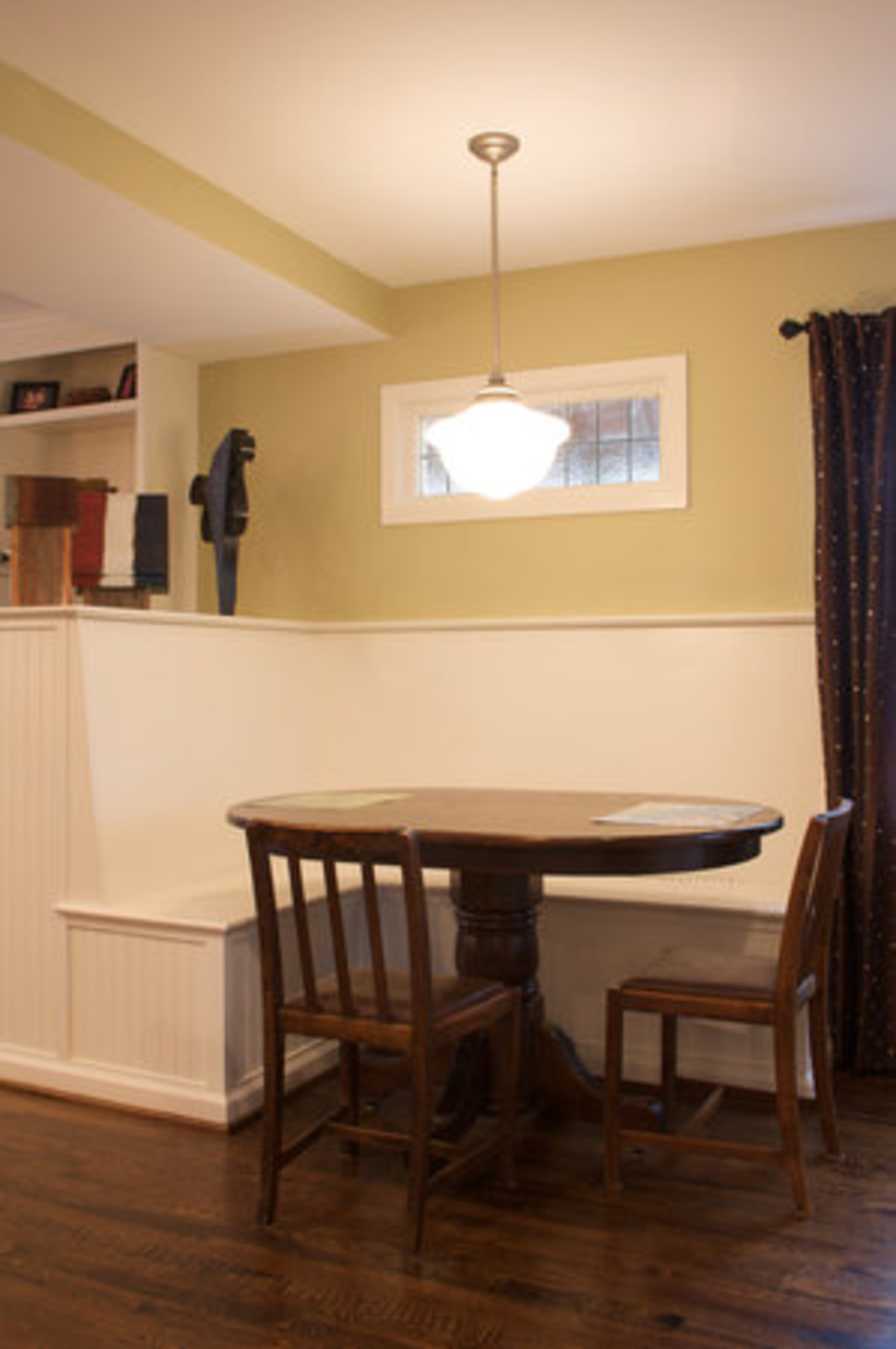 Jim Walker, owner of Copper Sky Renovations, helped in the design and remodel of Murray and Michelle Shevlin's home. The built-in breakfast area was constructed to accommodate the family of five during many of their meals. The table is situated where the old patio door once stood.