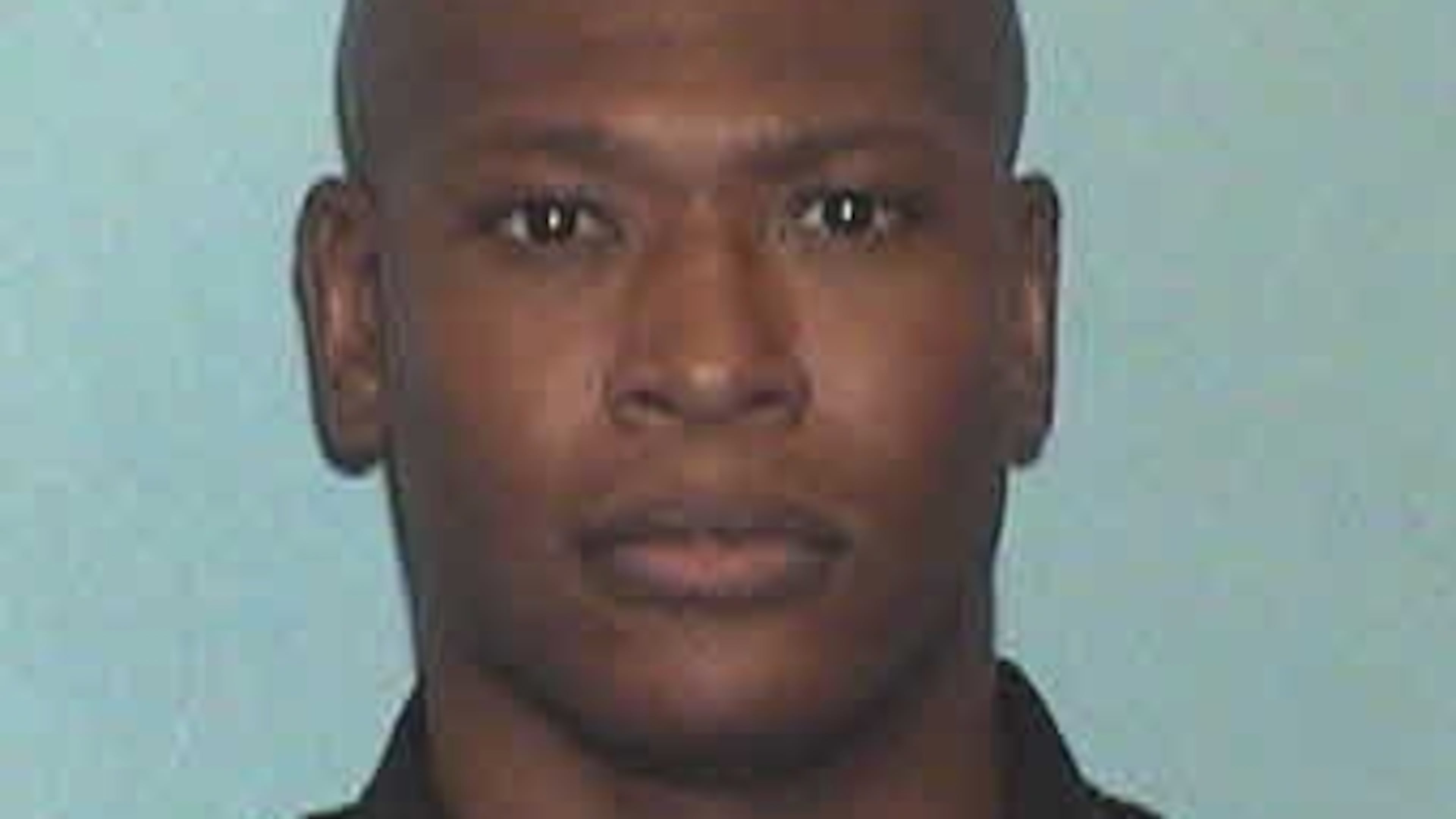 Atlanta police officer Reggie Robinson was shot Friday night while pursuing a suspect.