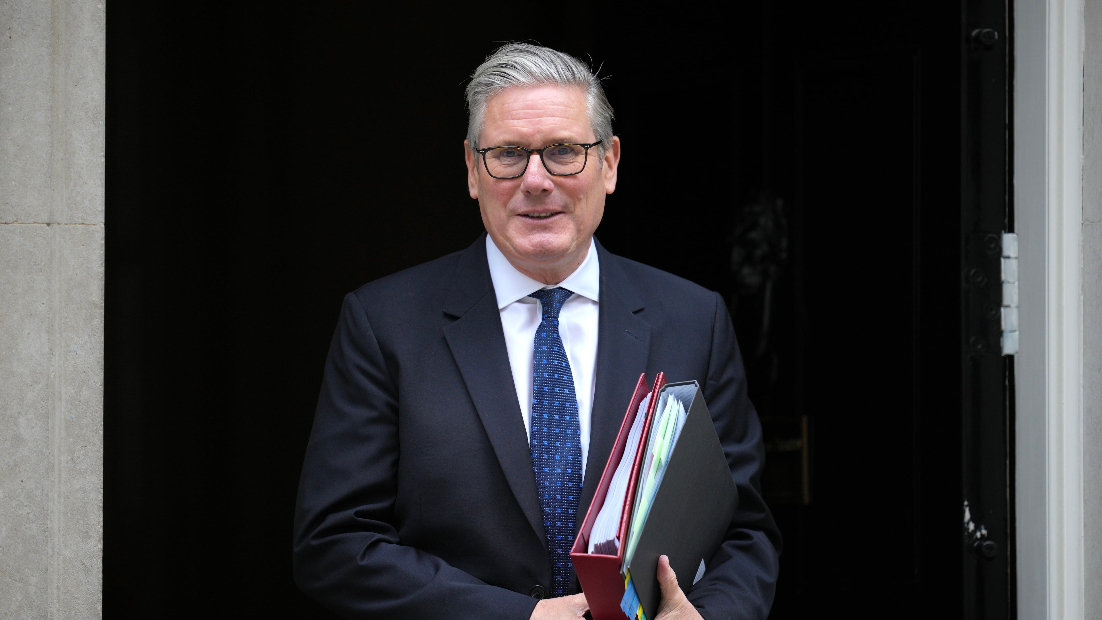 Britain's Prime Minister Keir Starmer leaves 10 Downing Street to attend the weekly session of Prime Minister's Questions in parliament in London, Wednesday, June 10, 2026. (AP Photo/Kin Cheung)