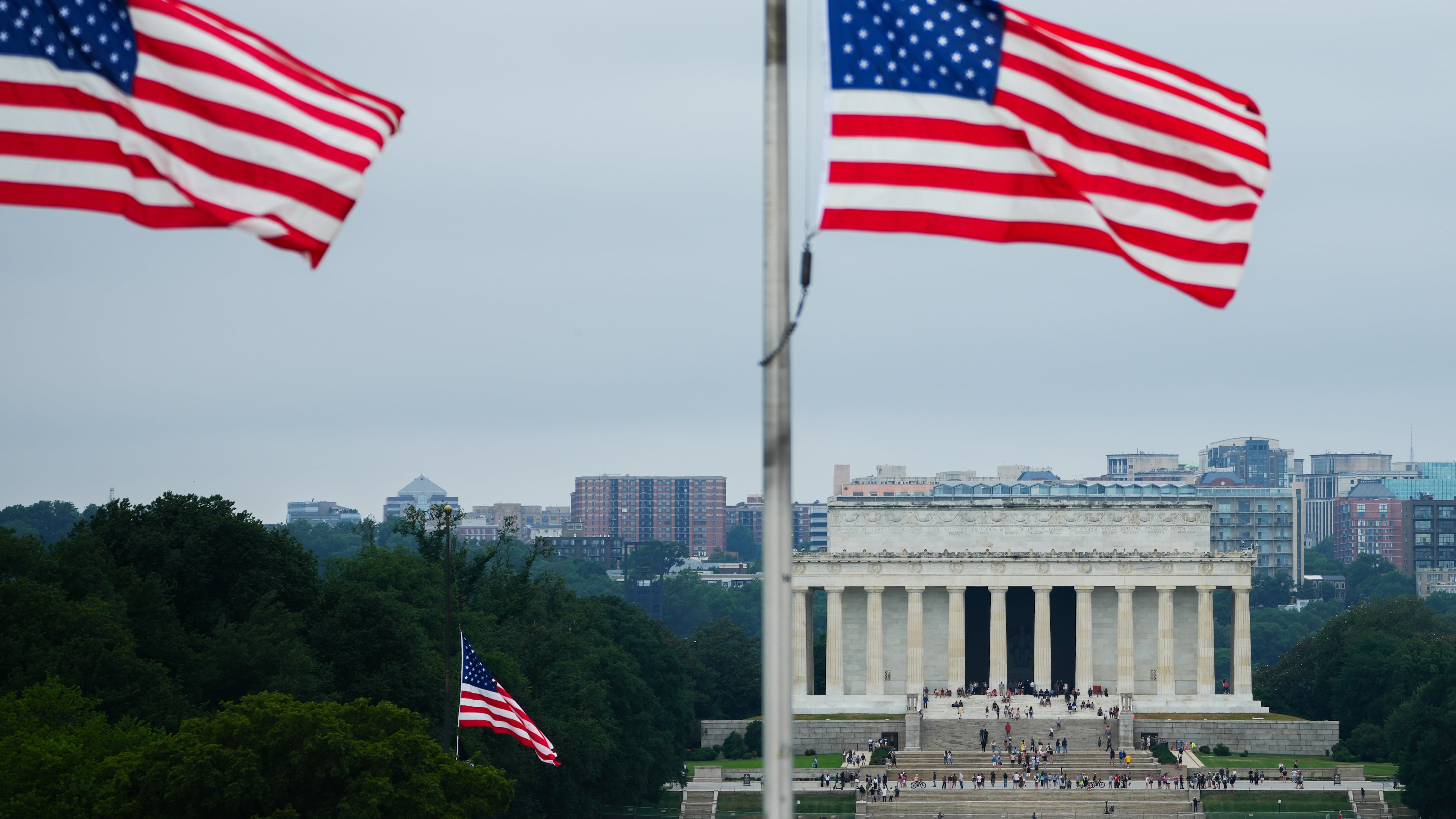 American flags fly above the Lincoln Memorial, Thursday, July 9, 2026, in Washington. (AP Photo/Julia Demaree Nikhinson)