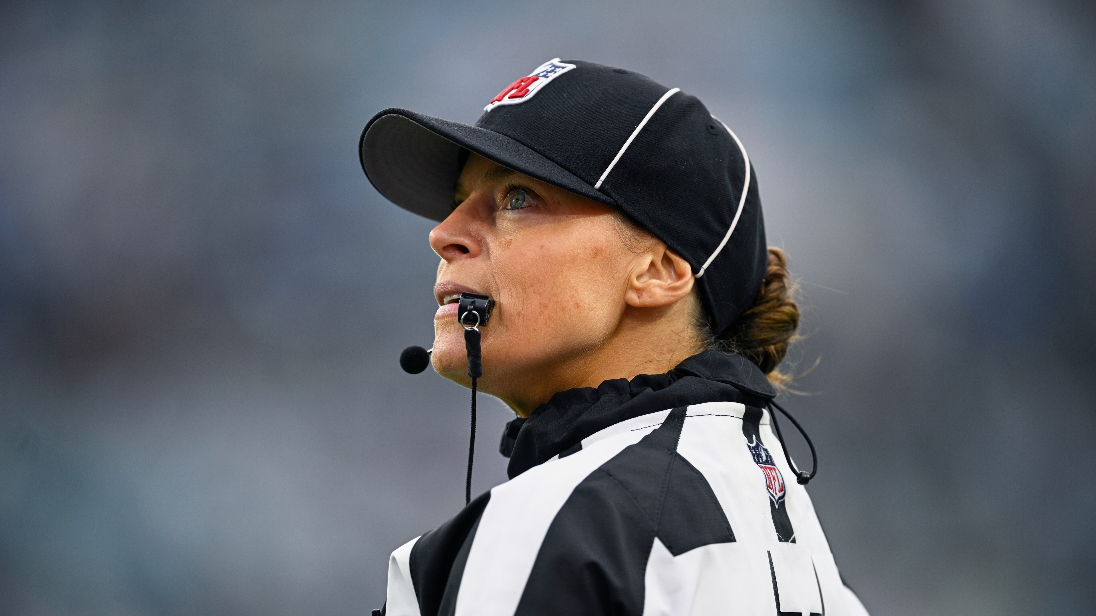 FILE - Line judge Robin DeLorenzo looks on during the second half of an NFL football game between the Jacksonville Jaguars and the Tennessee Titans, Dec. 29, 2024, in Jacksonville, Fla. (AP Photo/Phelan M. Ebenhack, File)