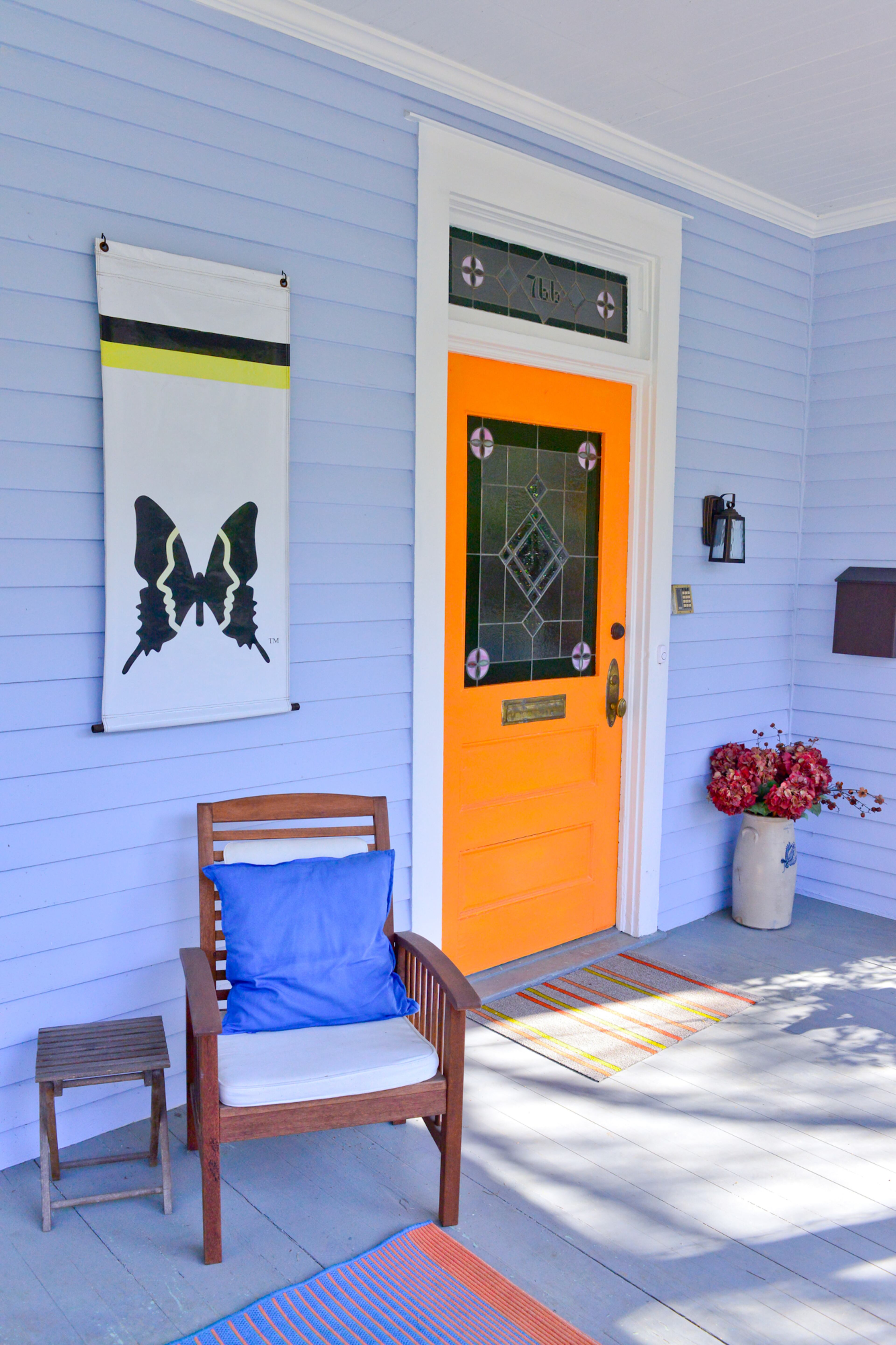The butterfly is Inman Park's symbol, and is next to the front door that homeowners Bill Goodman and Karen Goeckel painted orange. The home is on the 2016 Inman Park Tour of Homes on April 30-May 1.