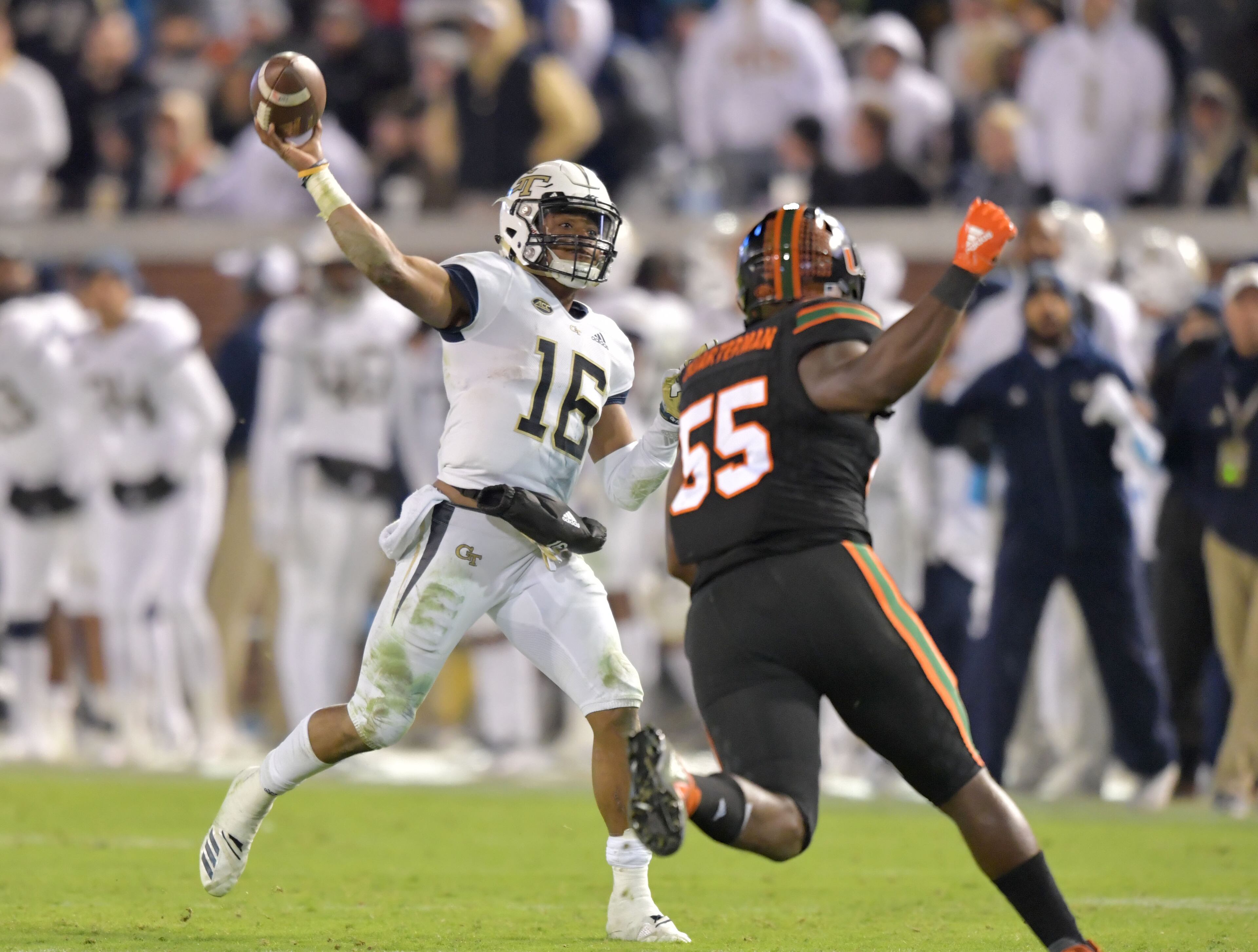 November 10, 2018 Atlanta - Georgia Tech quarterback TaQuon Marshall (16) gets off a pass to Georgia Tech wide receiver Brad Stewart for a touchdown in the second half at Bobby Dodd Stadium on Saturday, November 10, 2018. Georgia Tech won 27 - 21 over the Miami. HYOSUB SHIN / HSHIN@AJC.COM