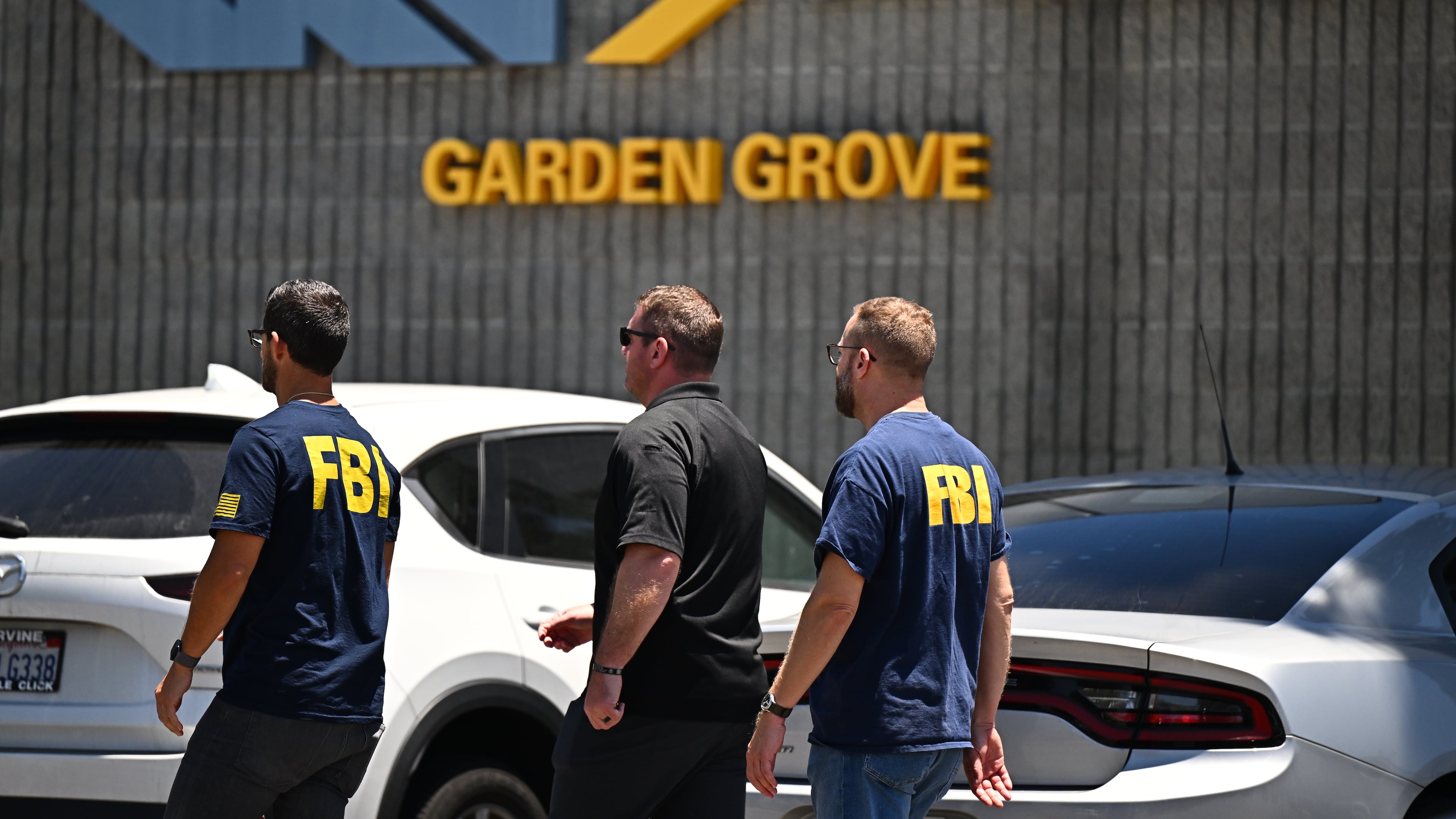 FBI agents work around GKN Aerospace in Garden Grove, Calif. on Wednesday, June 10, 2026. (AP Photo/William Liang)