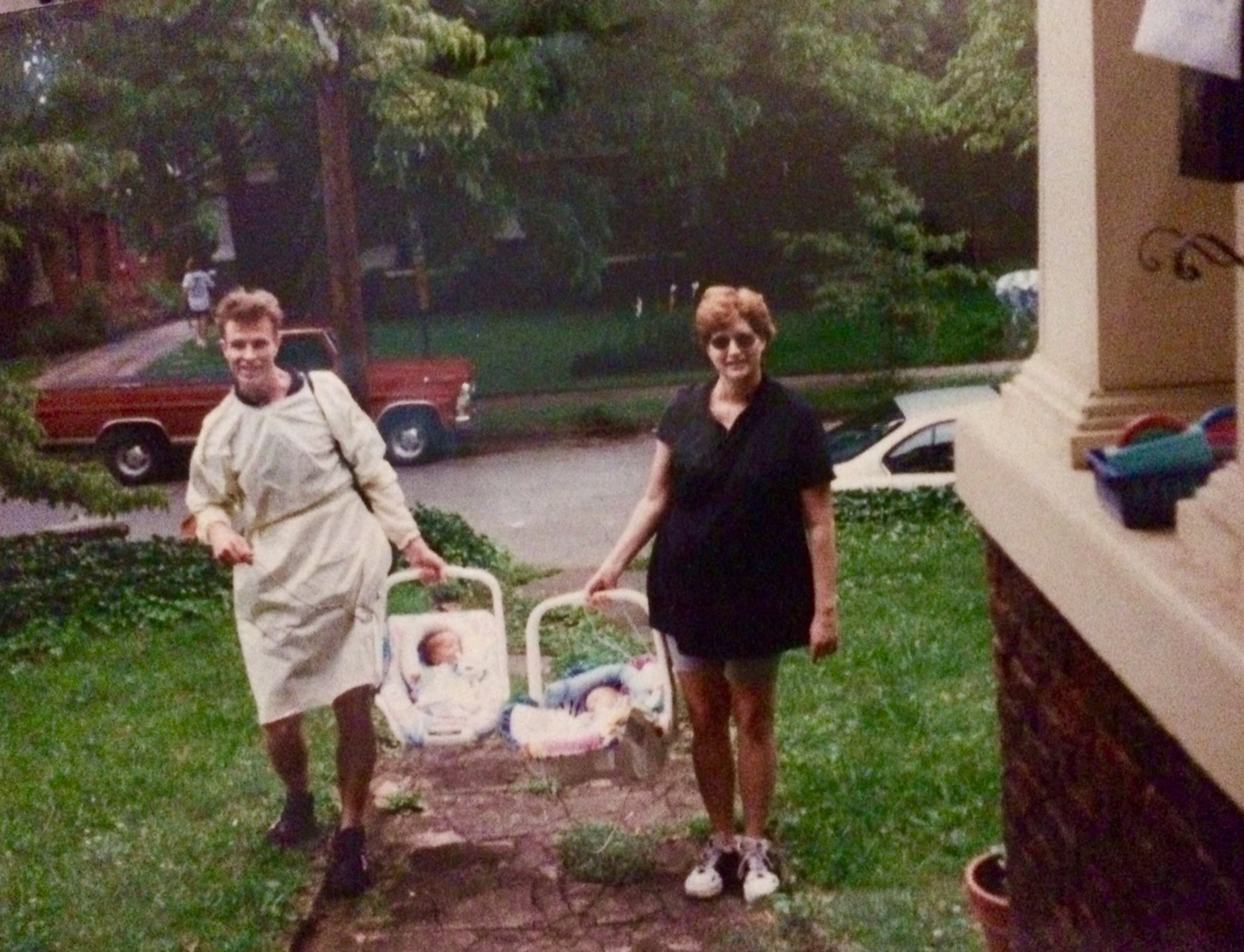 Bringing home our twin babies in 1997. (Note, that’s a hospital gown I’m wearing, not a dress!)