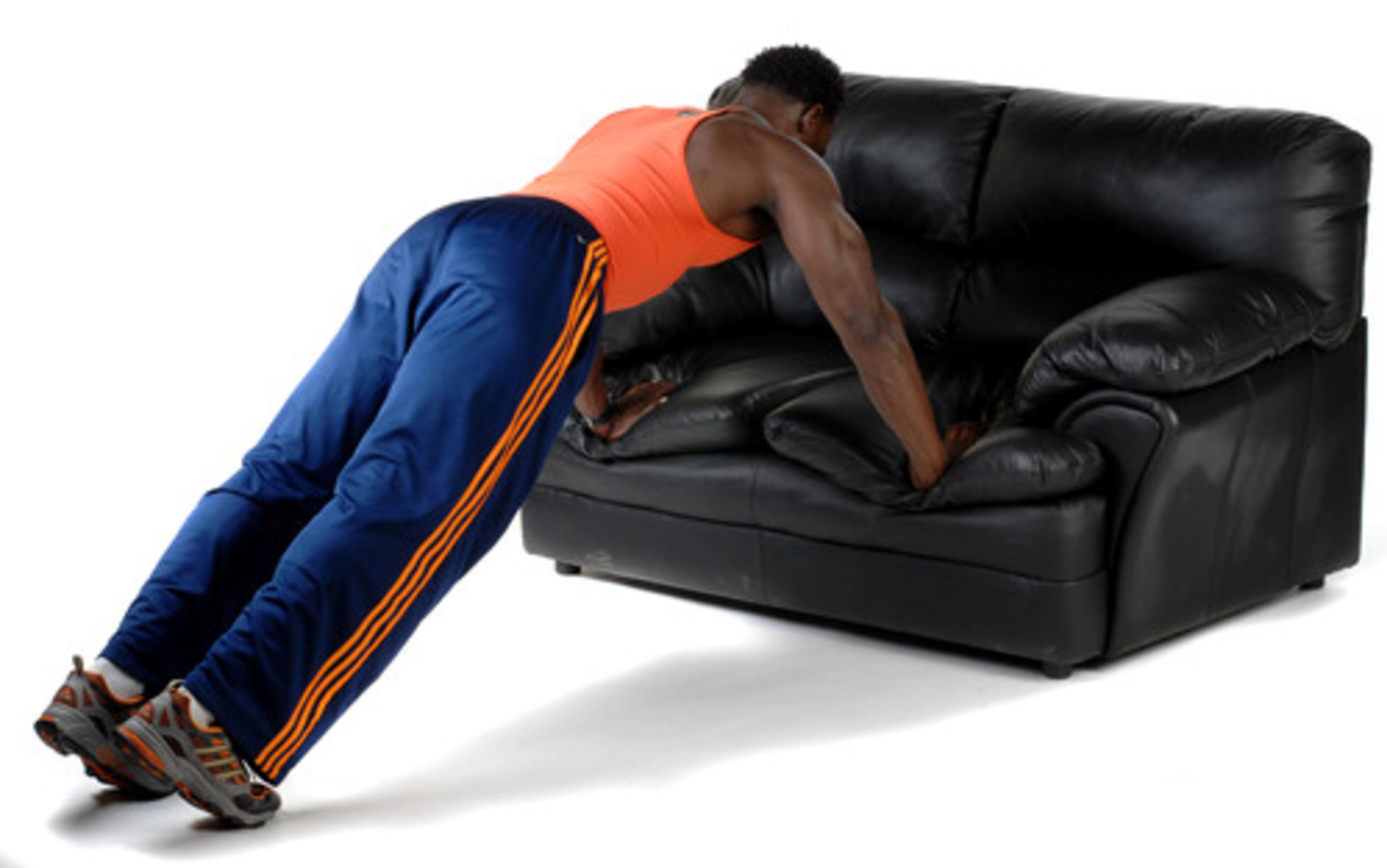 INCLINED PUSH UP Face couch with knees to floor. Hands should be shoulder-width apart on couch frame or cushion.