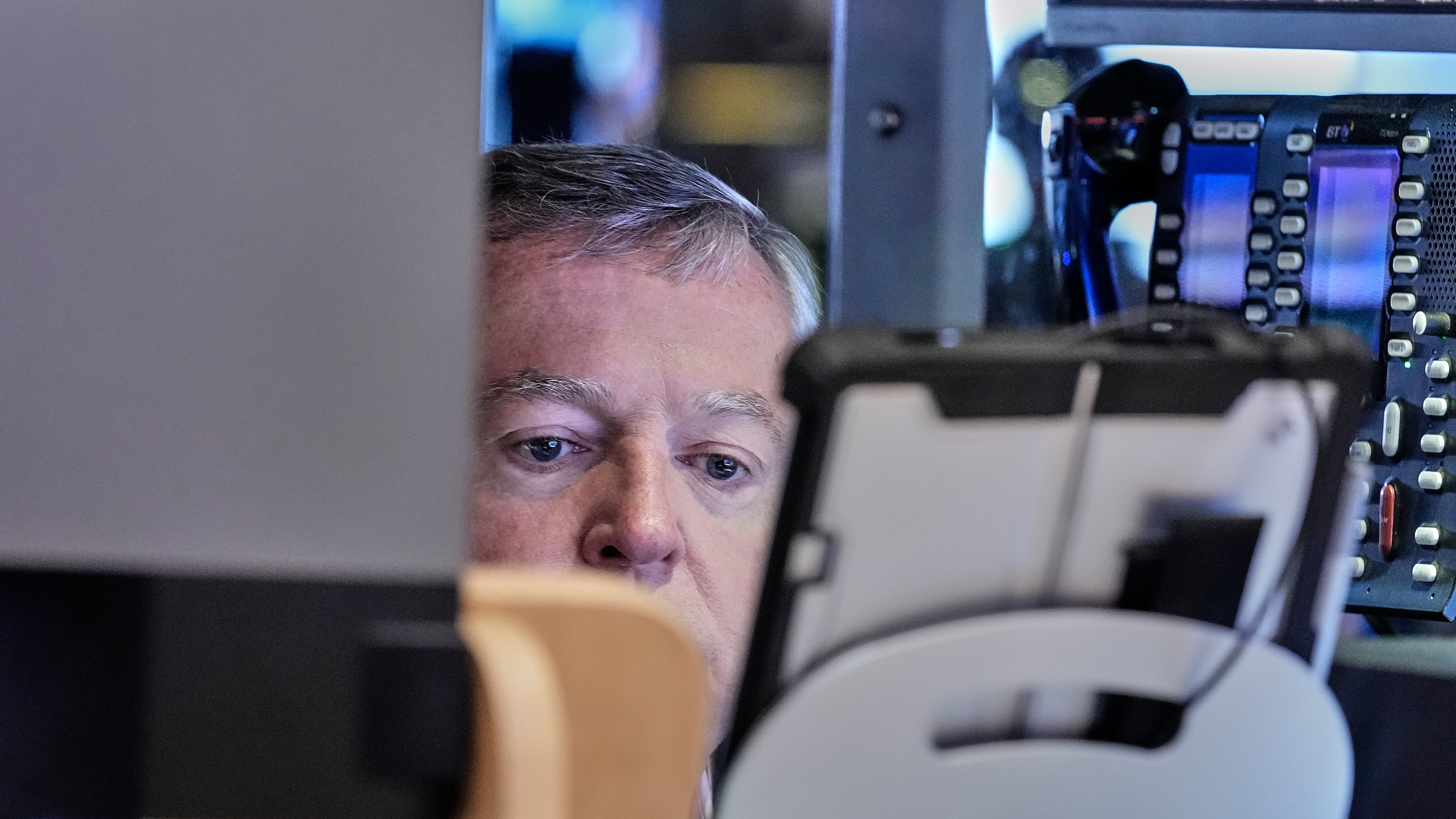 Trader James Lamb works on the floor of the New York Stock Exchange, Friday, May 22, 2026. (AP Photo/Richard Drew)