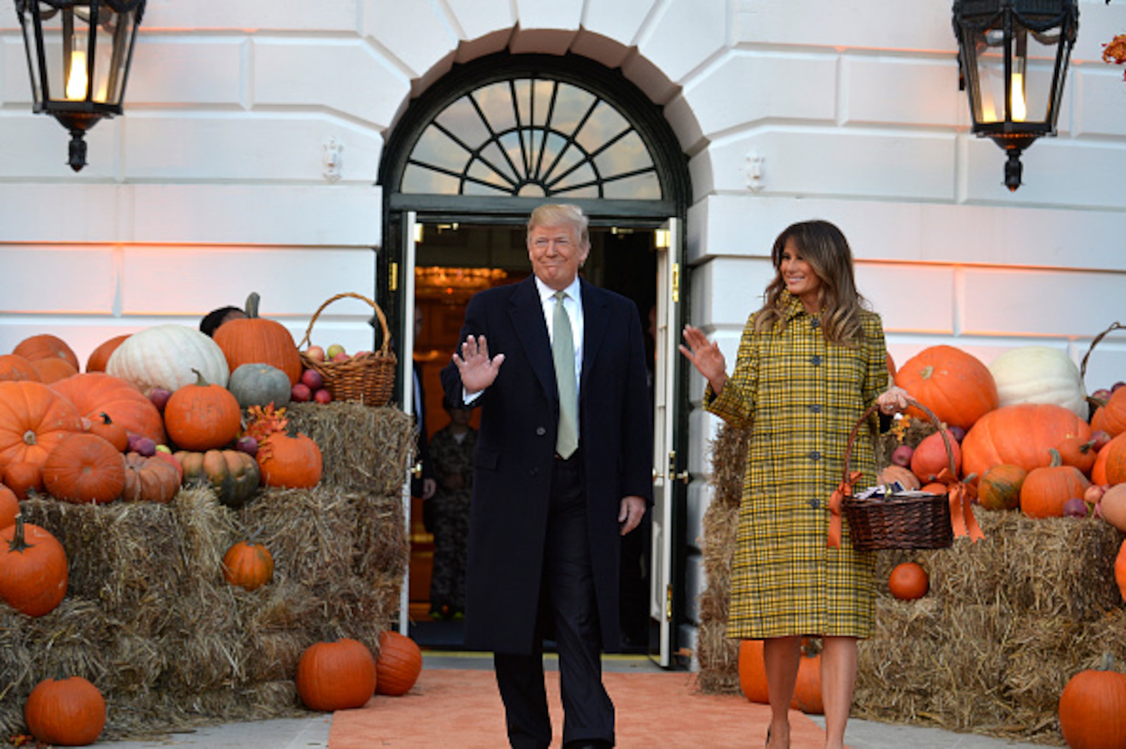 WASHINGTON, DC - OCTOBER 28: President Donald Trump and First Lady Melania Trump welcome trick-or-treaters to the White House for Halloween festivities, October 28, 2018, in Washington, DC. (Photo by Mike Theiler-Pool/Getty Images)