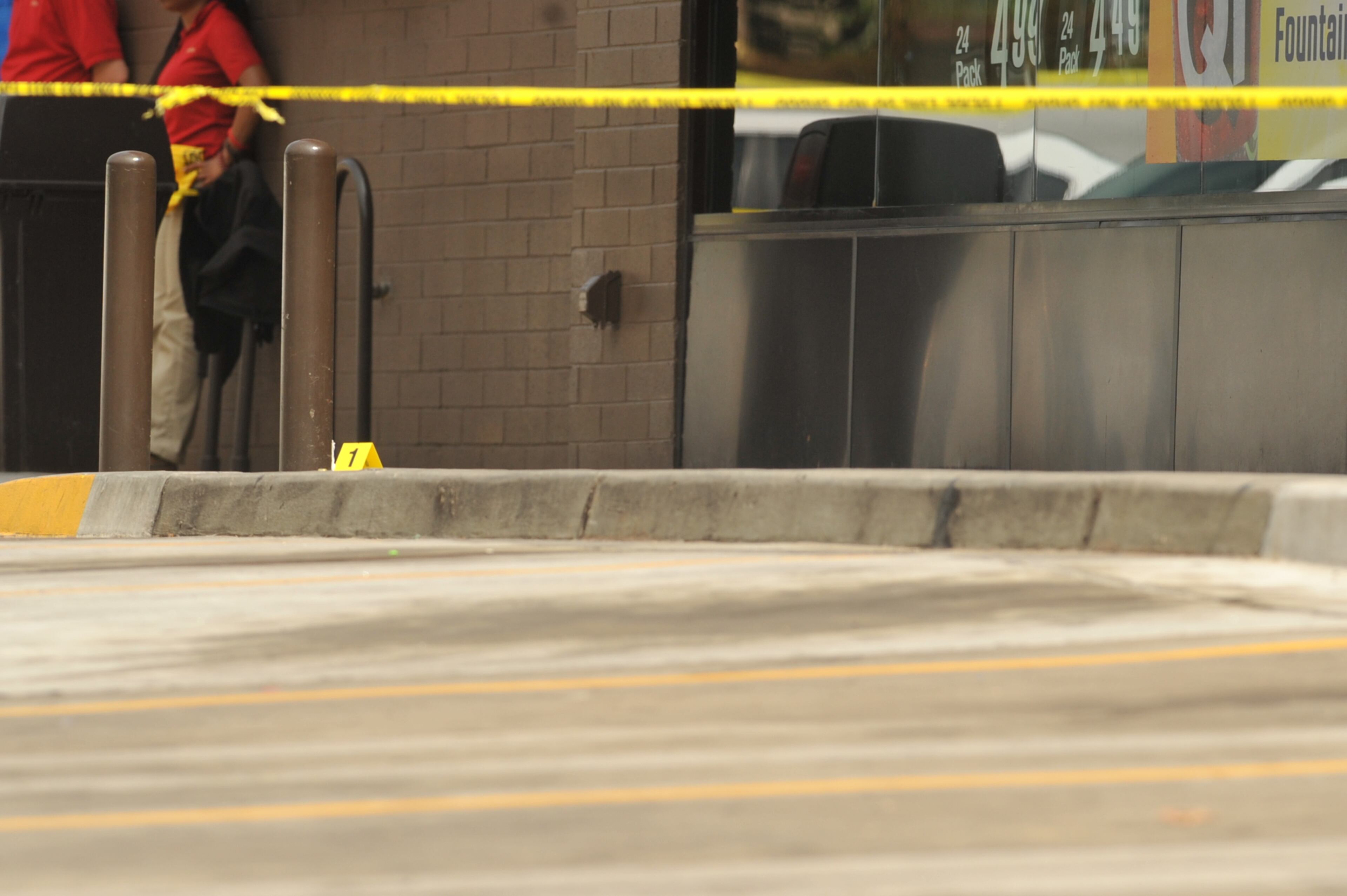 DeKalb County police were investigating a Labor Day shooting that happened inside a convenience store near Lithonia. The shooting happened around 1 p.m. Monday, Sept. 2, 2013 at the QuikTrip in the 7200 block of Rockbridge Road.