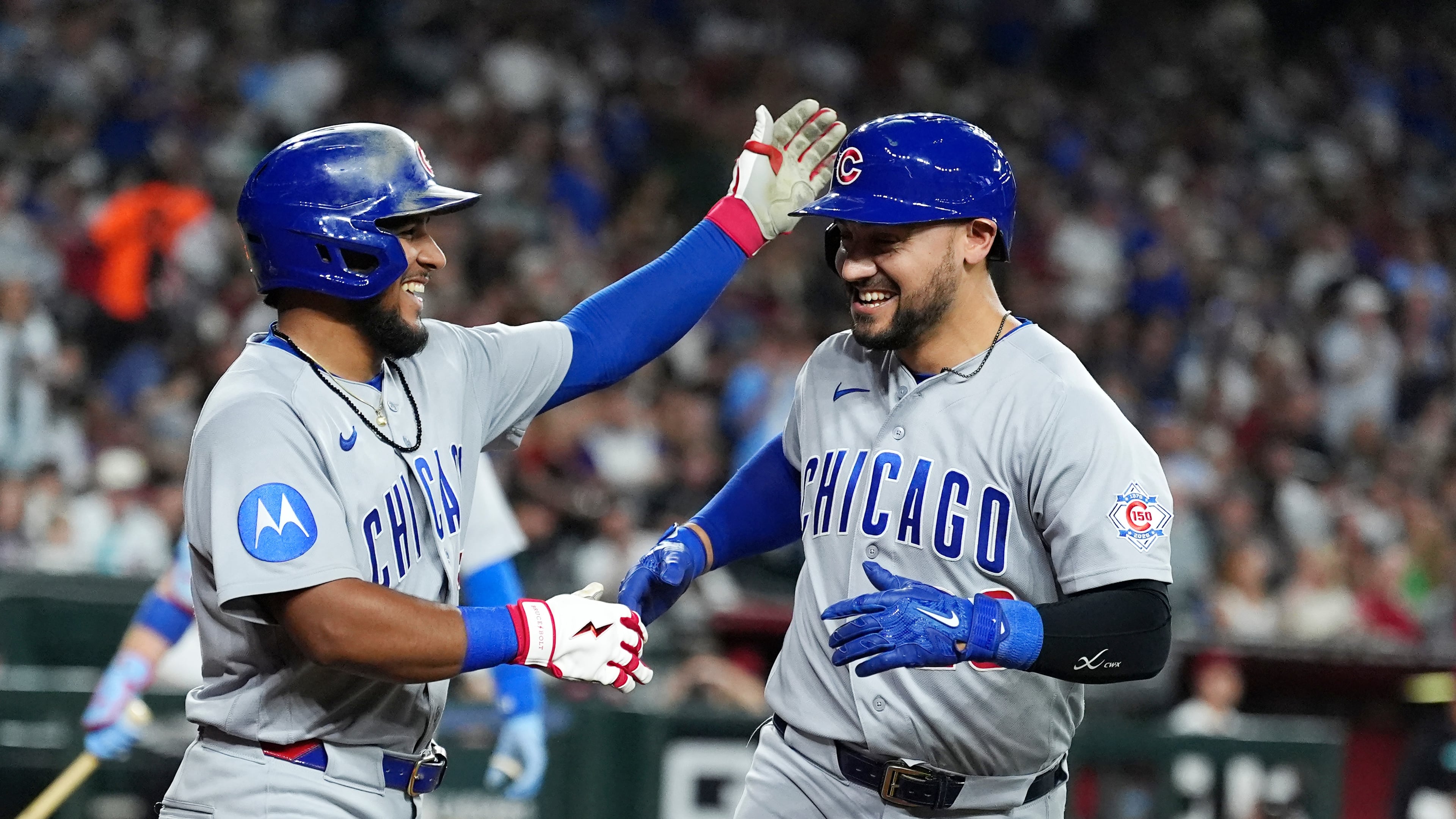 Chicago Cubs' Michael Conforto, right, celebrates his two-run home run against the Arizona Diamondbacks with Cubs' Pedro Ramírez during the sixth inning of a baseball game, Monday, Aug. 24, 2026, in Phoenix. (AP Photo/Ross D. Franklin)