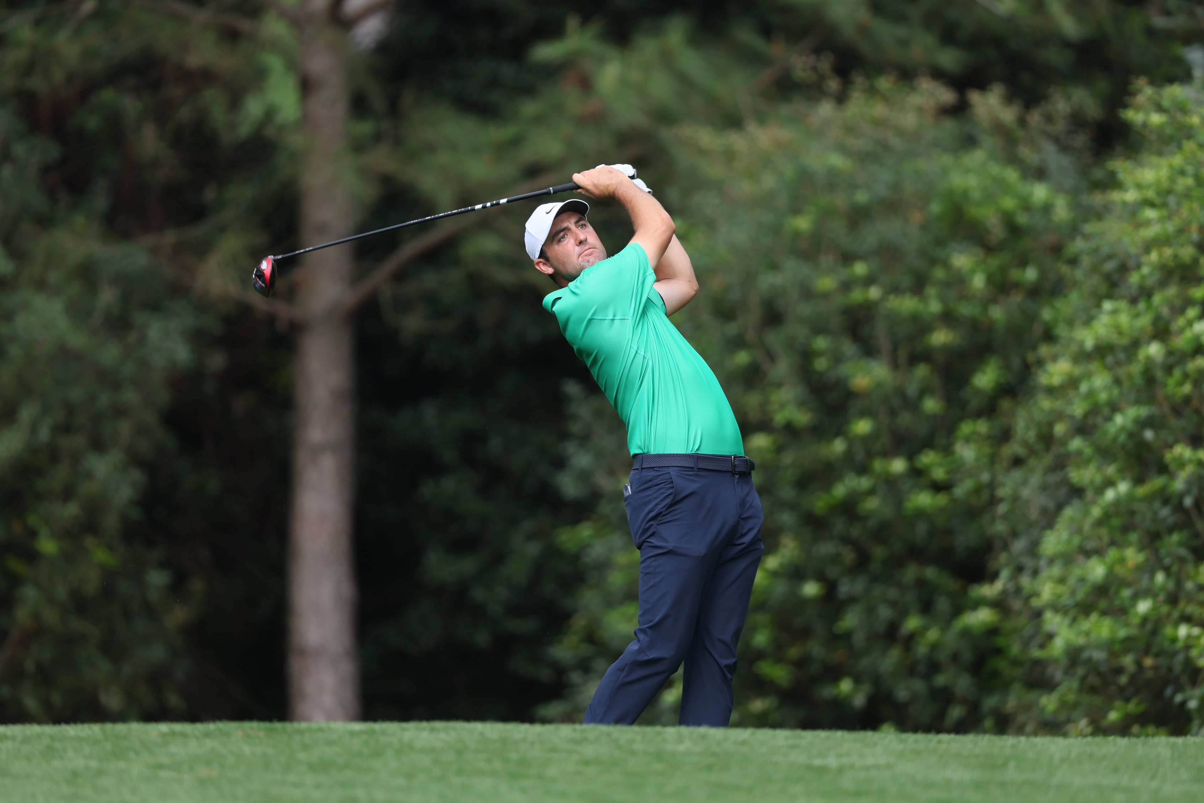 Scottie Scheffler hits off the 11th tee during first round of the 2023 Masters Tournament at Augusta National Golf Club, Thursday, April 6, 2023, in Augusta, Ga. (Jason Getz / Jason.Getz@ajc.com)