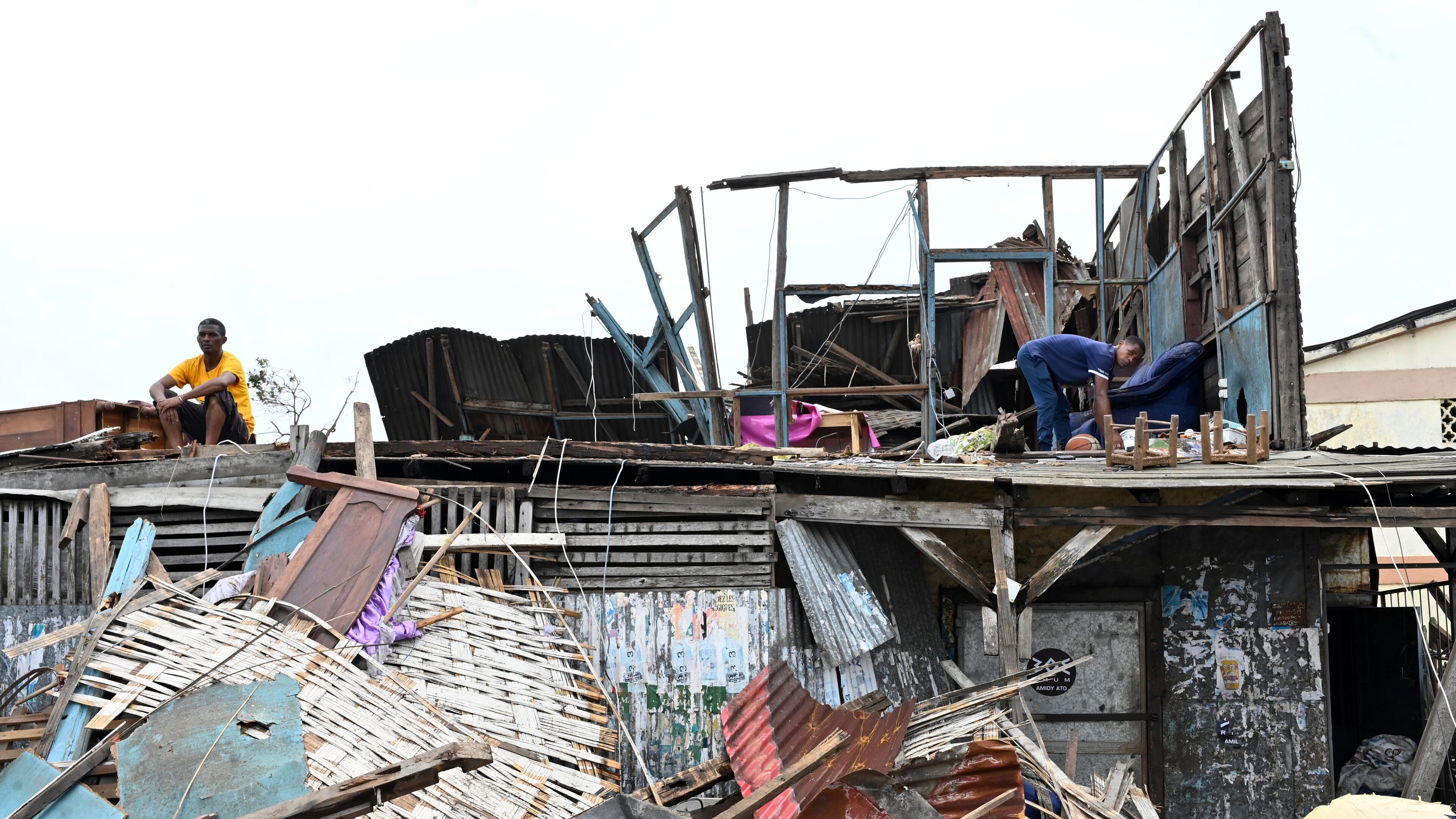 People survey the damage done by cyclone Gezani in Toamasina, Madagascar, Wednesday, Feb. 11, 2026. (AP Photo/Hery Nirina Rabary)