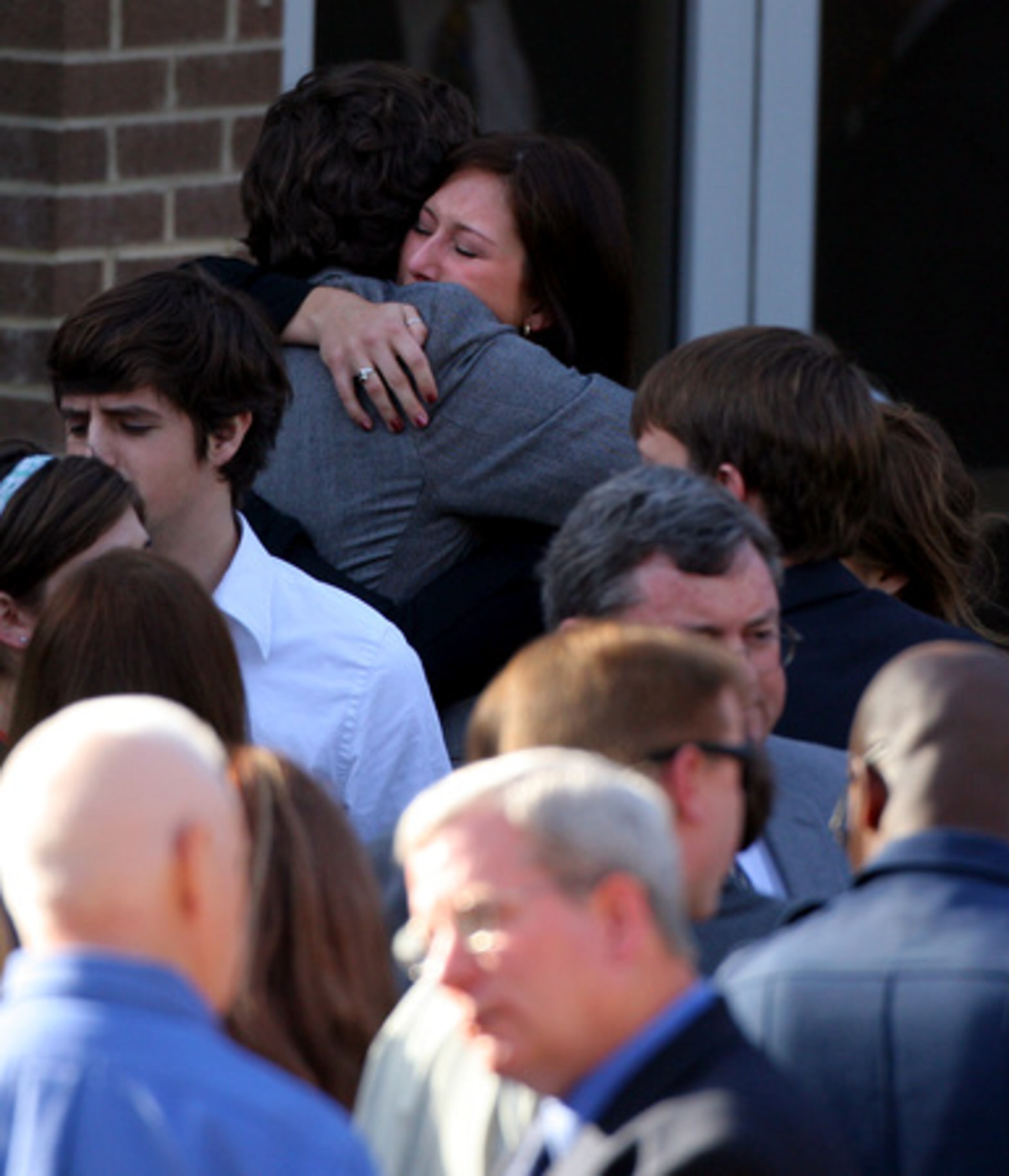 Family, friends, co-workers, search and rescue members, and firefighters were on hand for the emotional ceremony.
