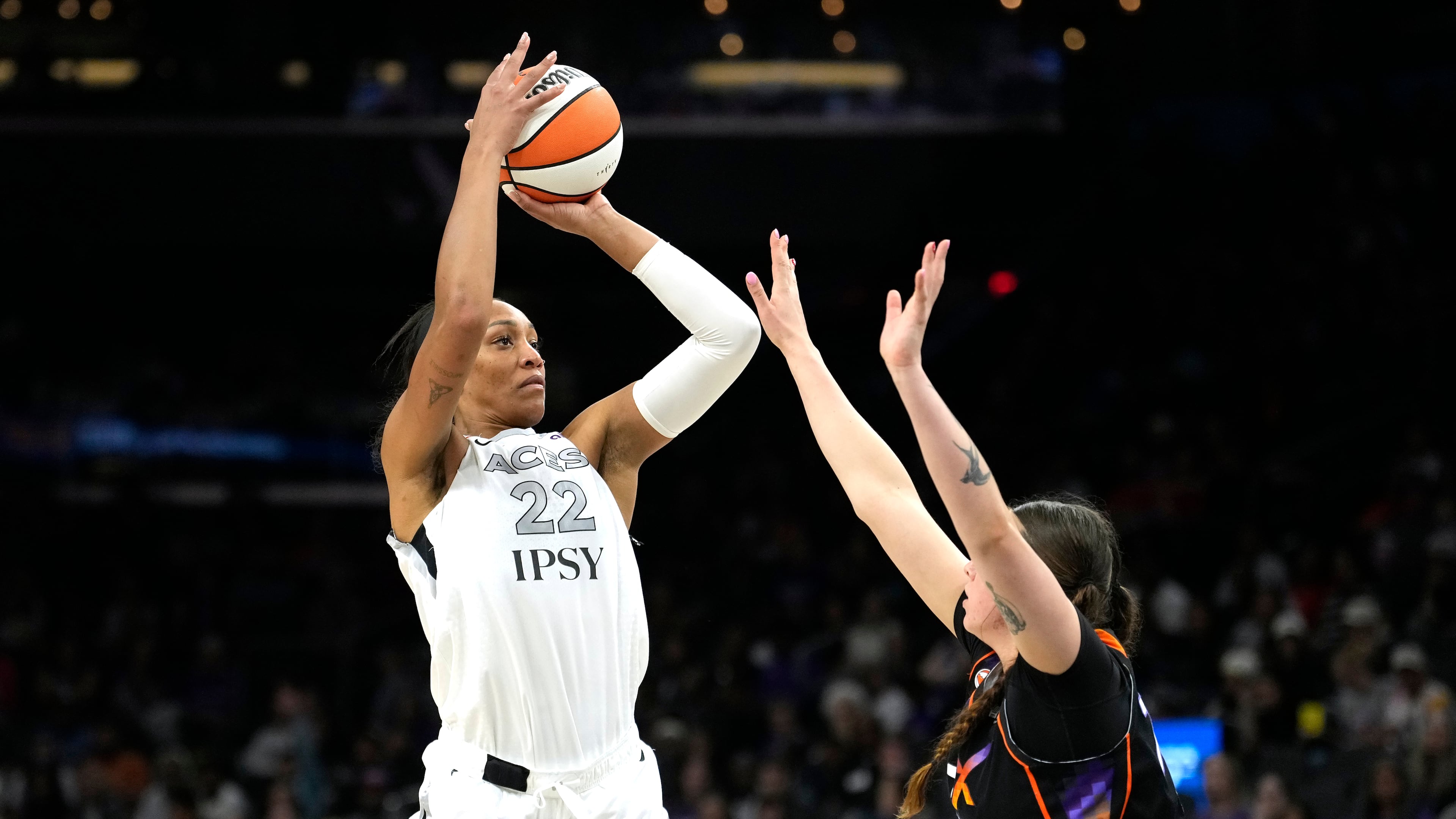 Las Vegas Aces center A'ja Wilson (22) shoots over Phoenix Mercury forward Marta Suarez during the second half of a WNBA basketball game, Thursday, Sept. 24, 2026, in Phoenix. (AP Photo/Ross D. Franklin)