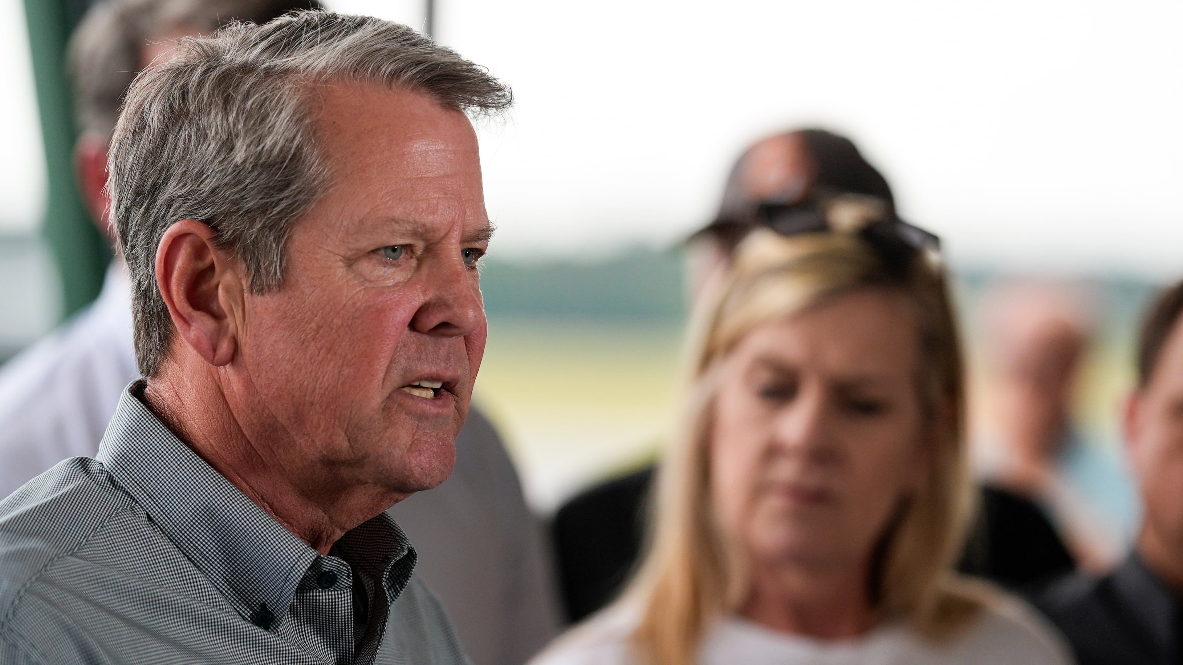 Gov. Brian Kemp speaks with reporters about the wildfires in South Georgia, Friday, April 24, 2026, in Waycross, Ga. (Mike Stewart/AP)