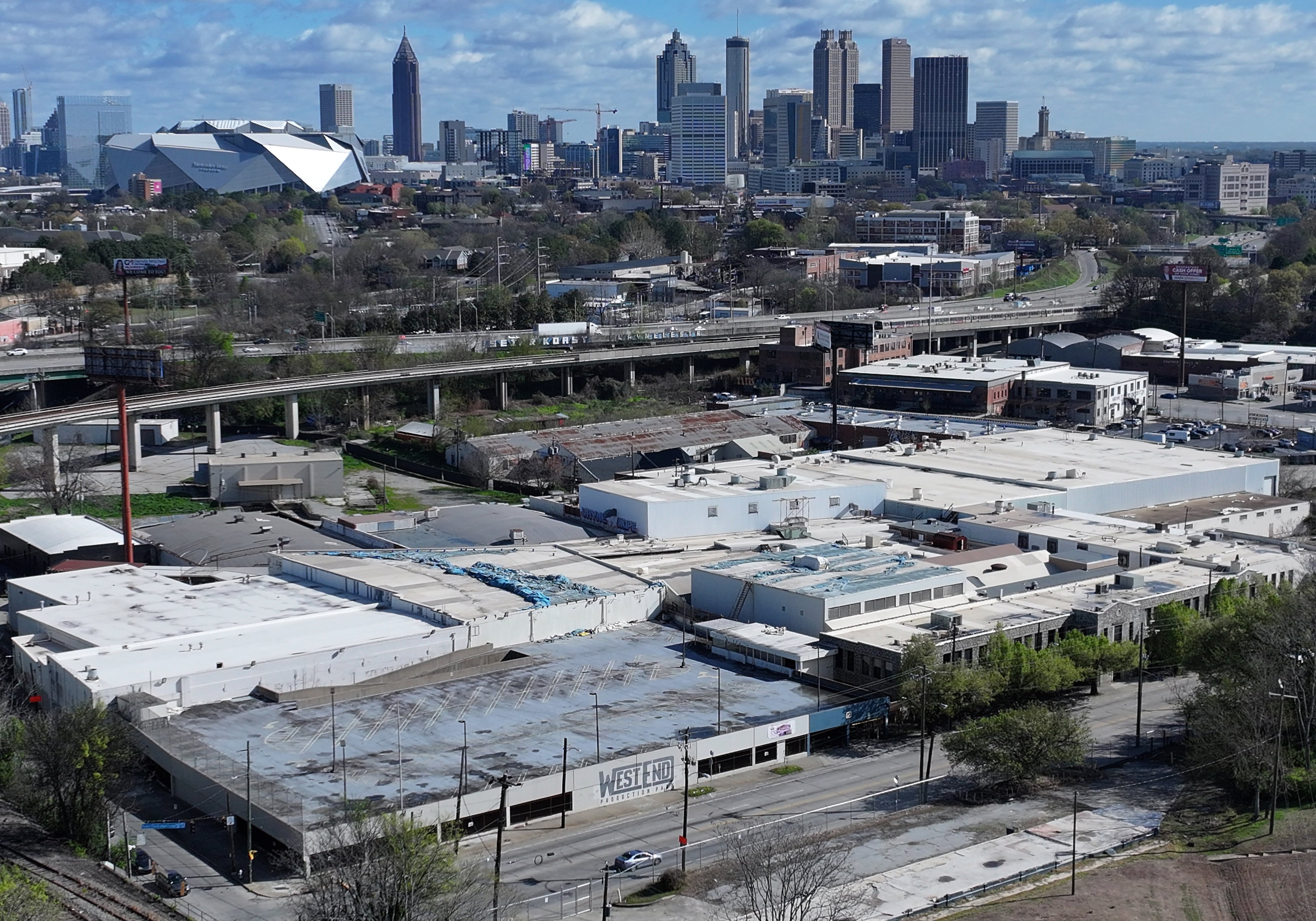 Aerial photo shows a planned Atlanta data center site (foreground) at 713 Ralph David Abernathy Blvd near West End MARTA station, Tuesday, March 17, 2026, in Atlanta. The city banned data centers near transit and the Beltline, but this one is trying to get an exception. (Hyosub Shin/AJC)