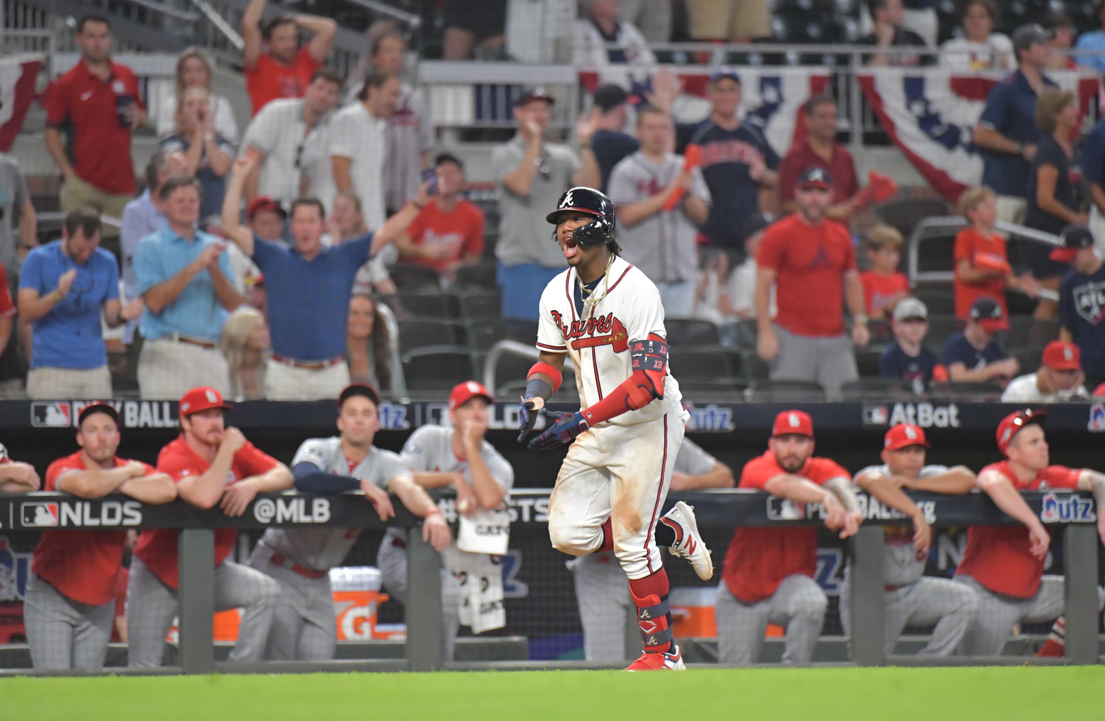 Ronald Acuna Jr. (13) hits a two-run home run in the 9th inning. (Hyosub Shin / Hyosub.Shin@ajc.com)