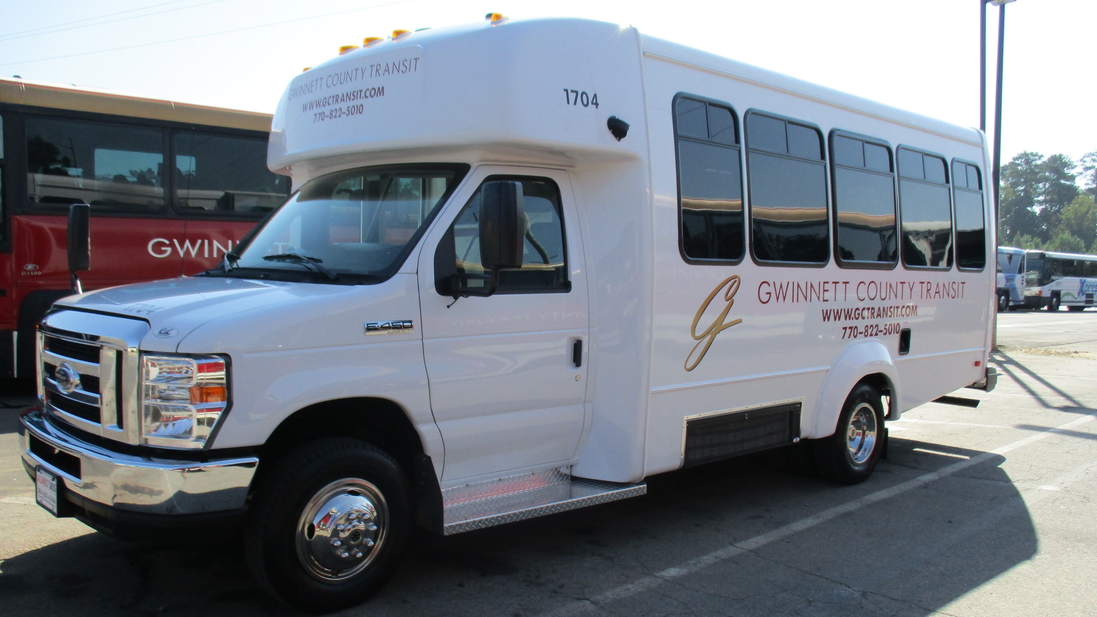 The vehicles used in Gwinnett County's pilot "microtransit" program in Snellville will be similar to the county's paratransit buses, one of which is shown here. (Courtesy of Gwinnett County)