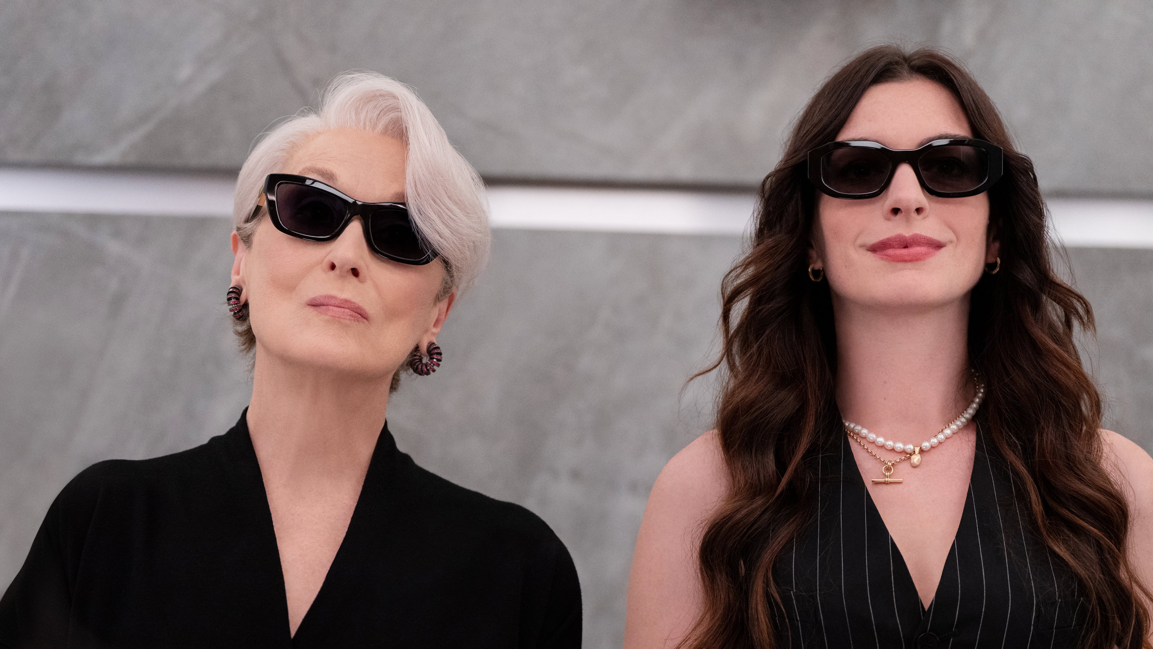 This image released by 20th Century Studios shows Meryl Streep, left, and Anne Hathaway in a scene from "The Devil Wears Prada 2." (Macall Polay/20th Century Studios via AP)