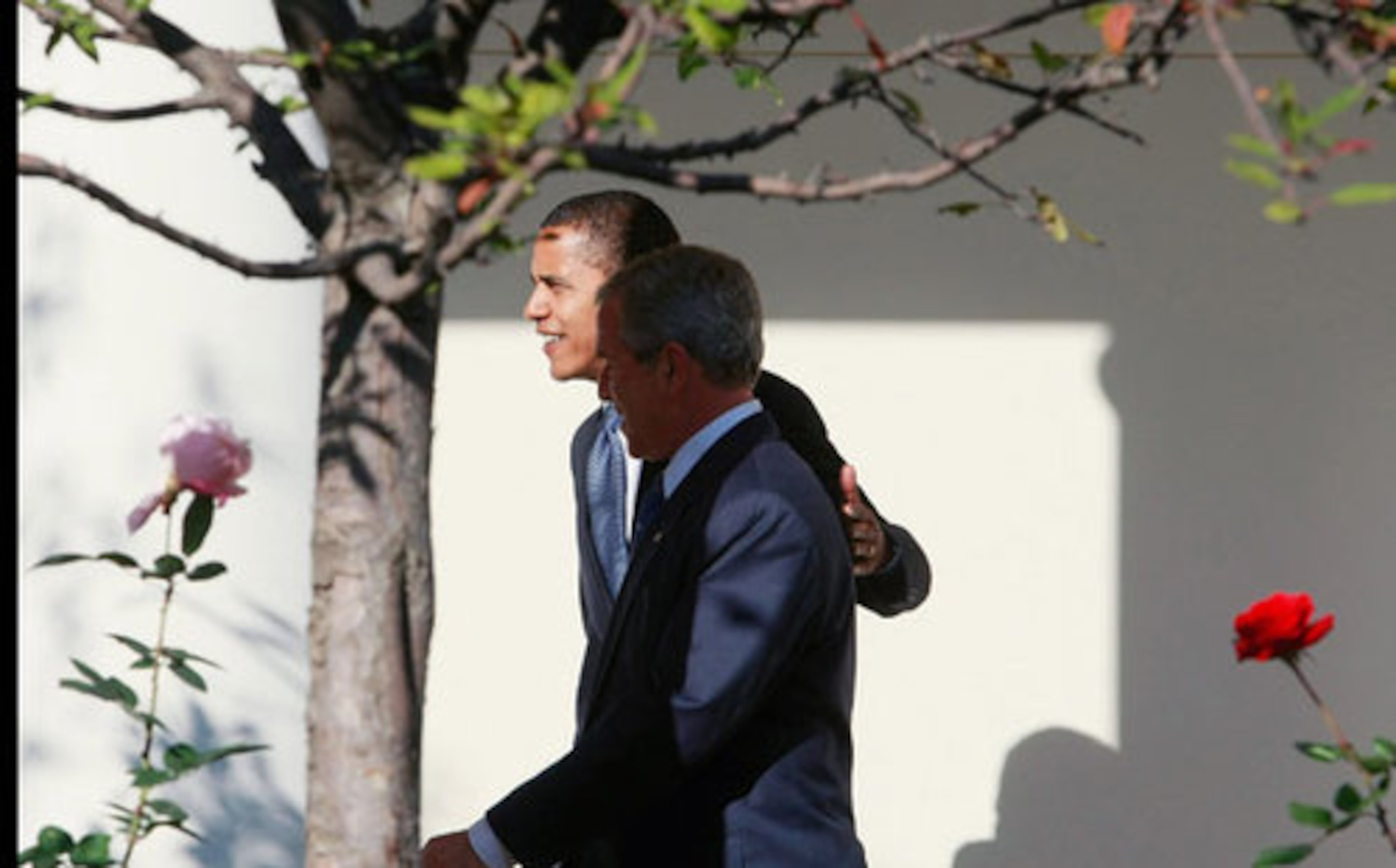 President-elect Barack Obama and President George W. Bush walk along the South Portico at the White House.
