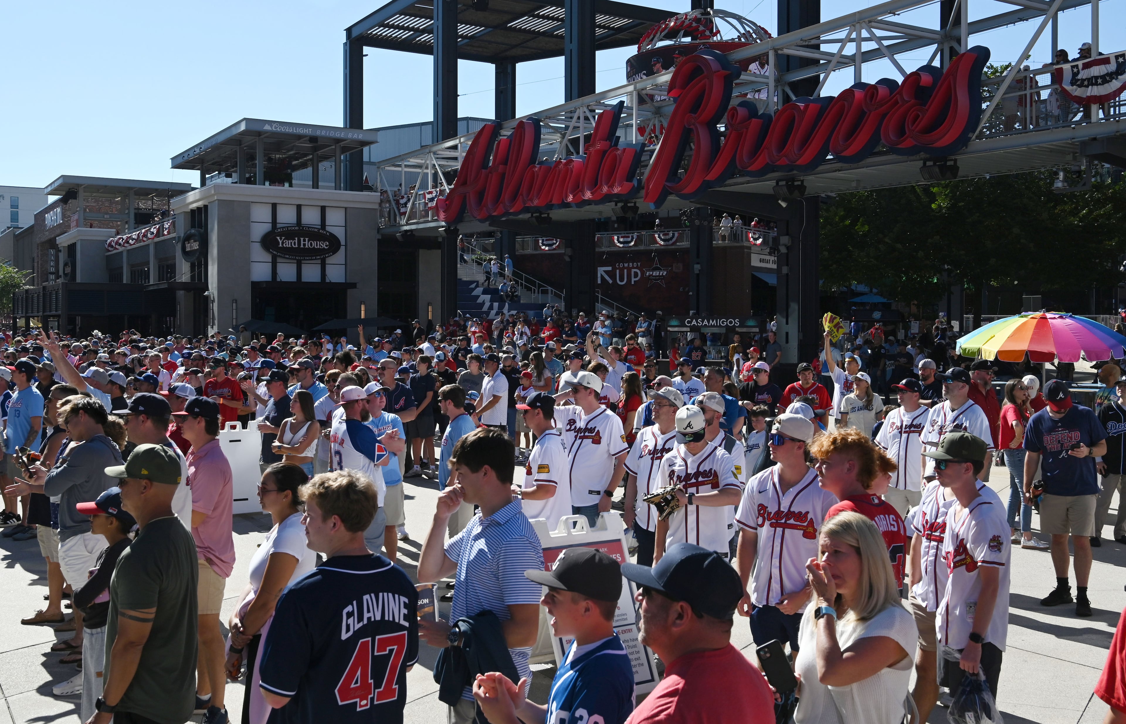 Baseball fans wait for the gates to open before Game 3 of the National League Division Series between Atlanta Braves and Los Angeles Dodgers at Truist Park on Tuesday, Oct. 6, 2026, in Atlanta. (Hyosub Shin/AJC)