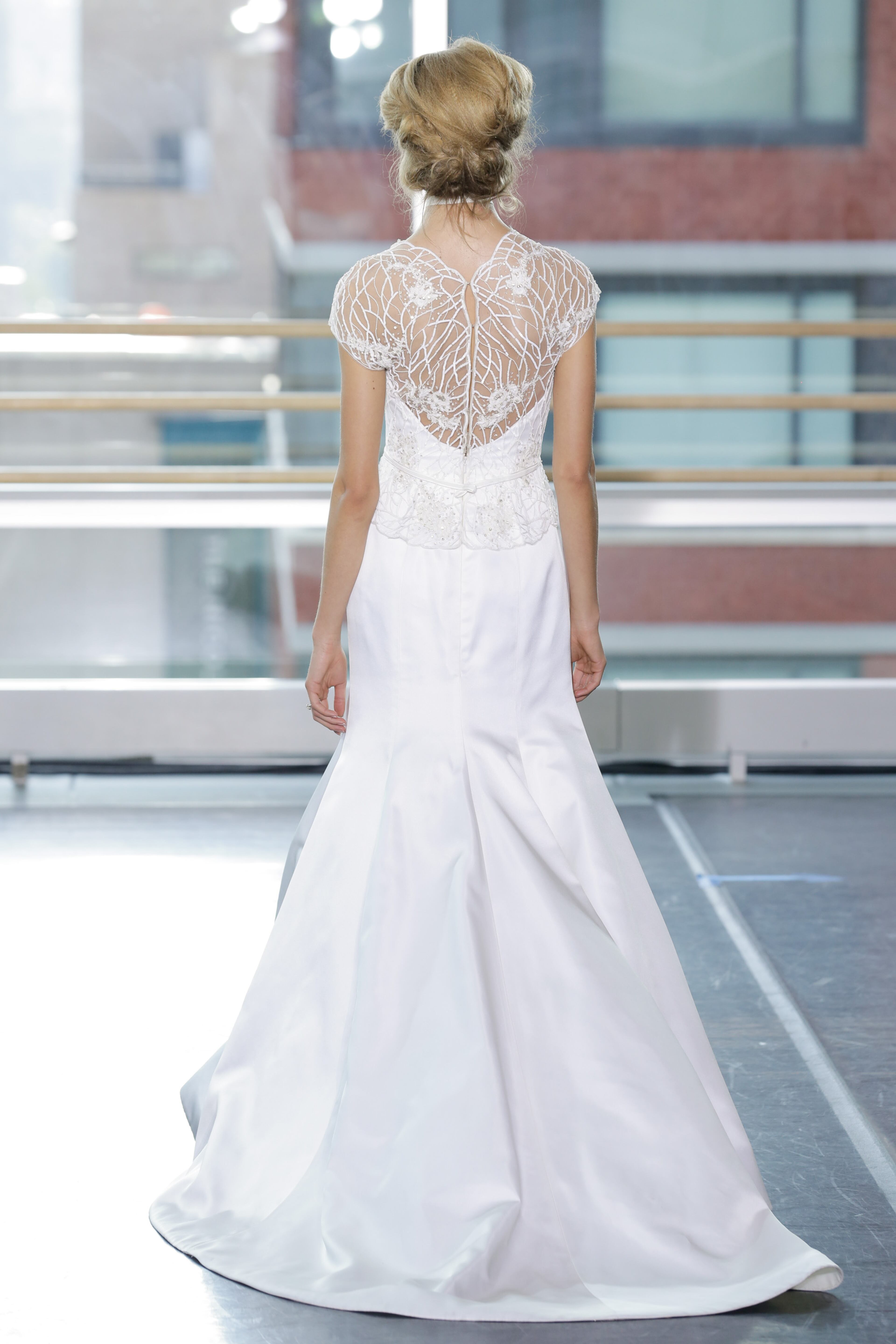 A model walks the runway during the Rita Vinieris-Rivini Fall 2014 Bridal Collection at Alvin Alley Studios on Oct. 13, 2013, in New York City.