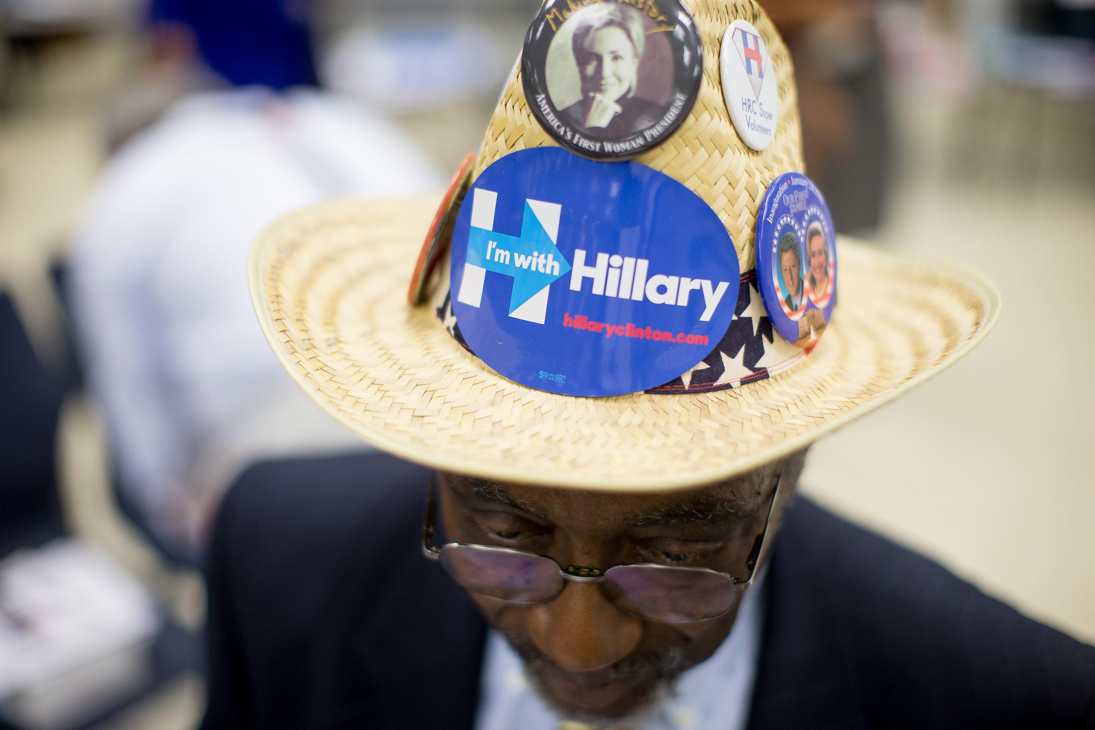 Franklin Delano Williams, who's running to be an at-large delegate, wears a hat covered in Hillary Clinton stickers and buttons at the IBEW Local 613 Auditorium, Saturday, June 11, 2016, in Atlanta. Members of the Georgia Democratic Party gathered to elect at-large and alternate delegates to the Democratic National Convention in Philadelphia. BRANDEN CAMP/SPECIAL