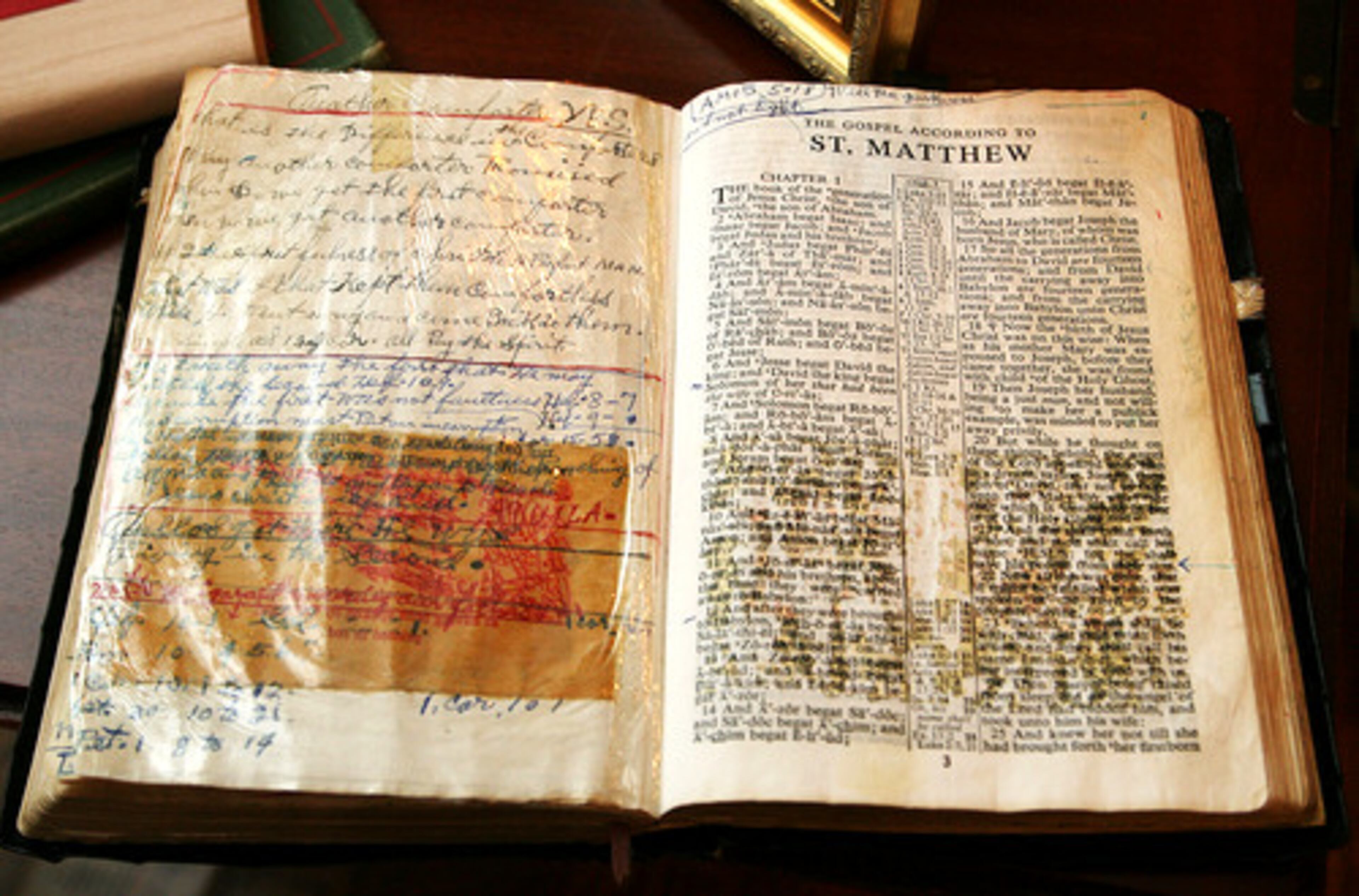 A Bible that belonged to Harry Beecham's grandfather, who was a preacher, sits with his sermon notes on an antique desk.