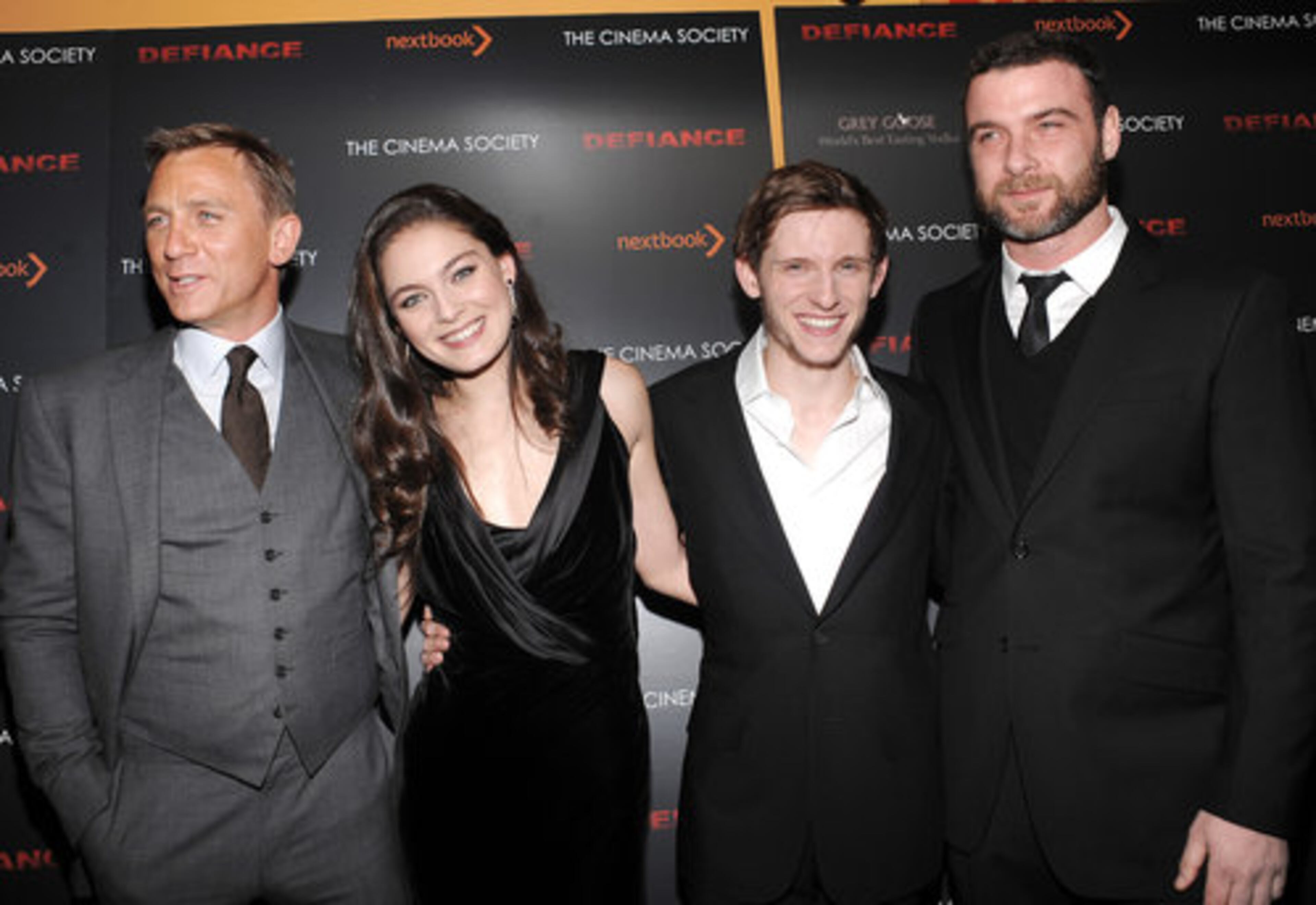 From left, actors Daniel Craig, Alexa Davalos, Jamie Bell and Liev Schreiber, who star in the film about three Jewish brothers who escape from Nazi-occupied Poland and join Russian resistance fighters. They work to build a village to protect themselves and others in danger.