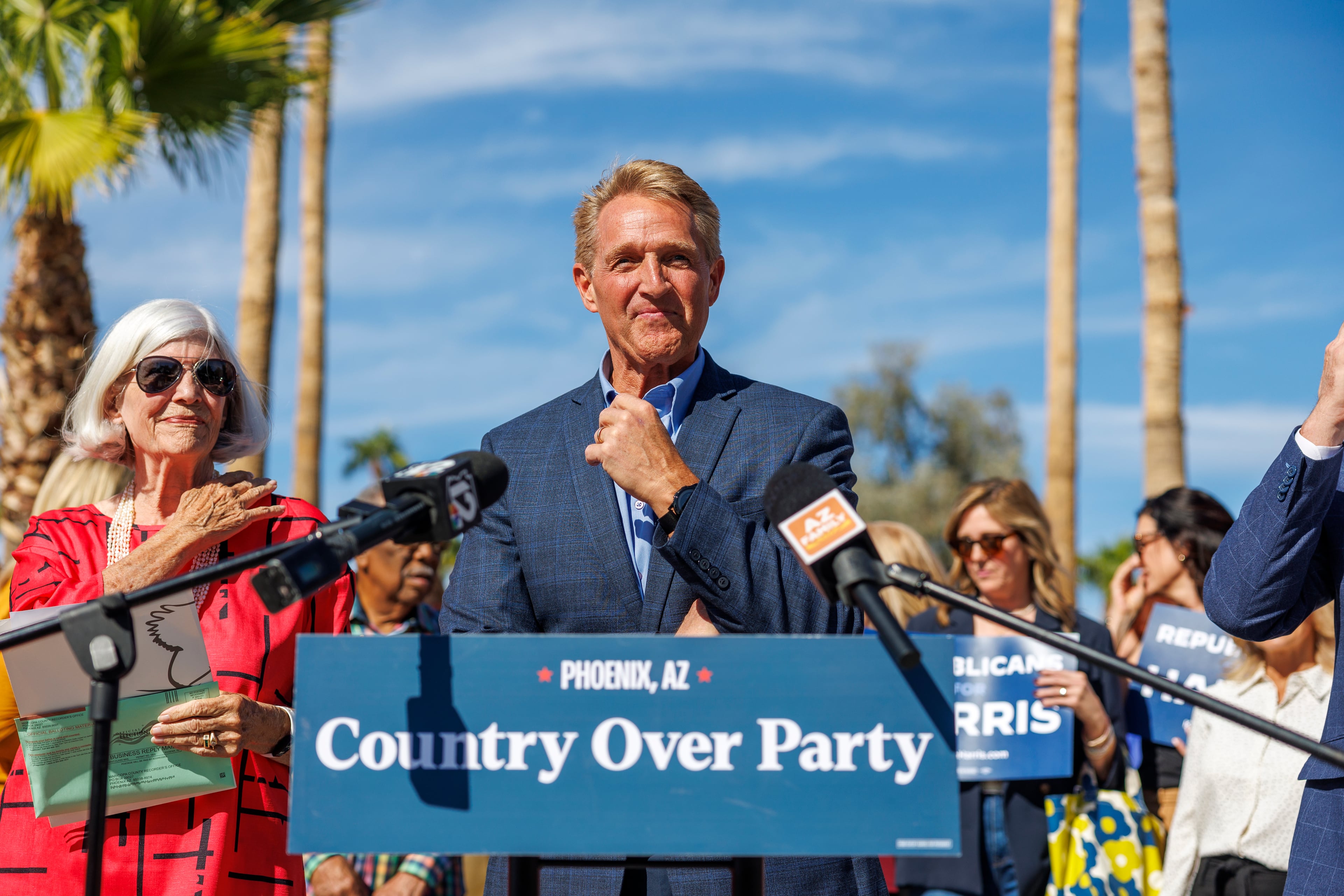 Former Republican Senator and Ambassador Jeff Flake speaks in support of Kamala Harris outside the Indian Bend Wash Visitor Center on October 30, 2024 in Scottsdale, Arizona. Now, Flake has endorsed Democrat U.S Sen. Jon Ossoff against his Republican opponent U.S. Rep. Mike Collins, saying that character matters more than partisan differences. (Gina Ferazzi/Los Angeles Times via Getty Images 2024)