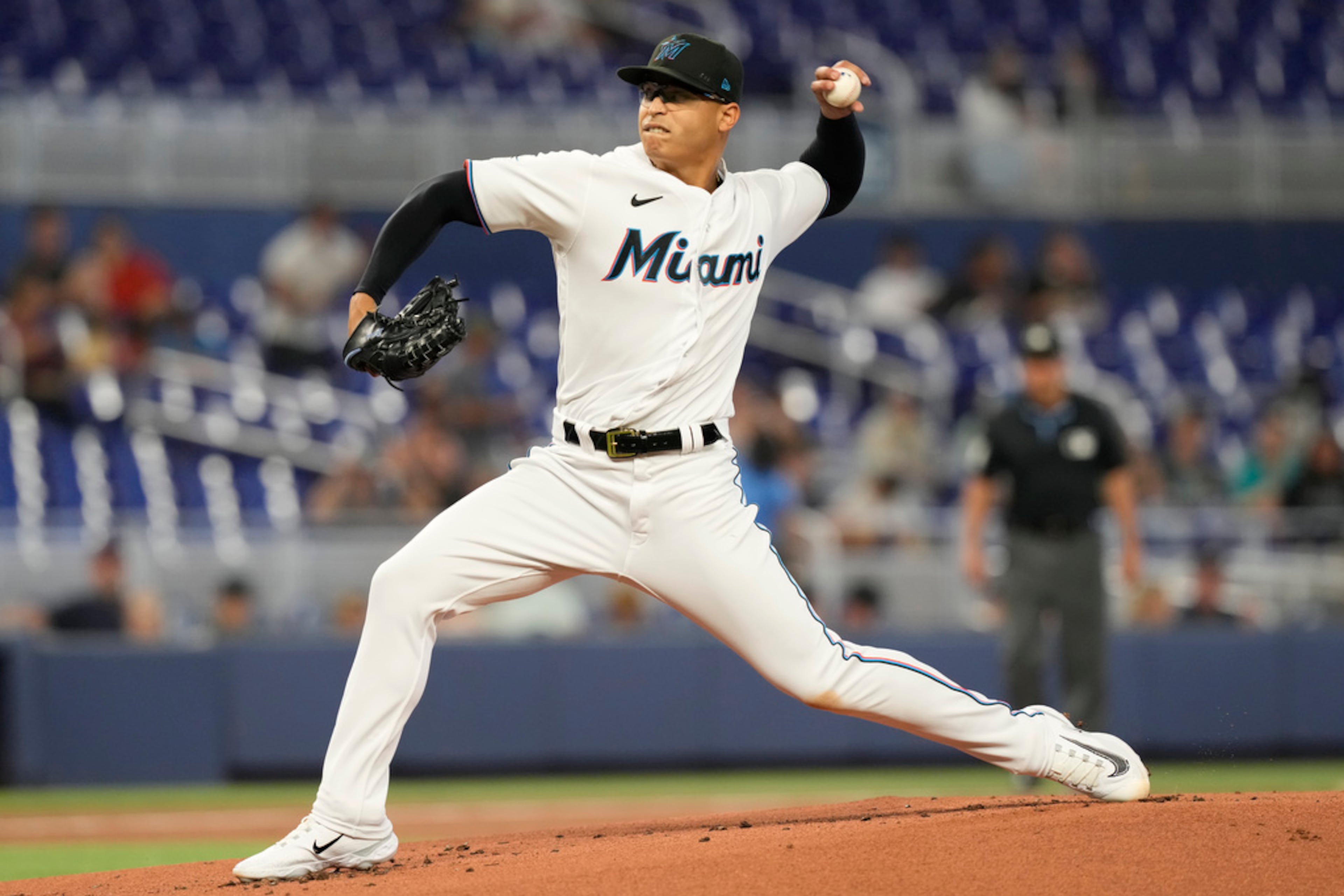 Miami Marlins starting pitcher Jesus Luzardo (44) aims a pitch during the first inning of a baseball game against the Atlanta Braves, Thursday, May 4, 2023, in Miami. (AP Photo/Marta Lavandier)