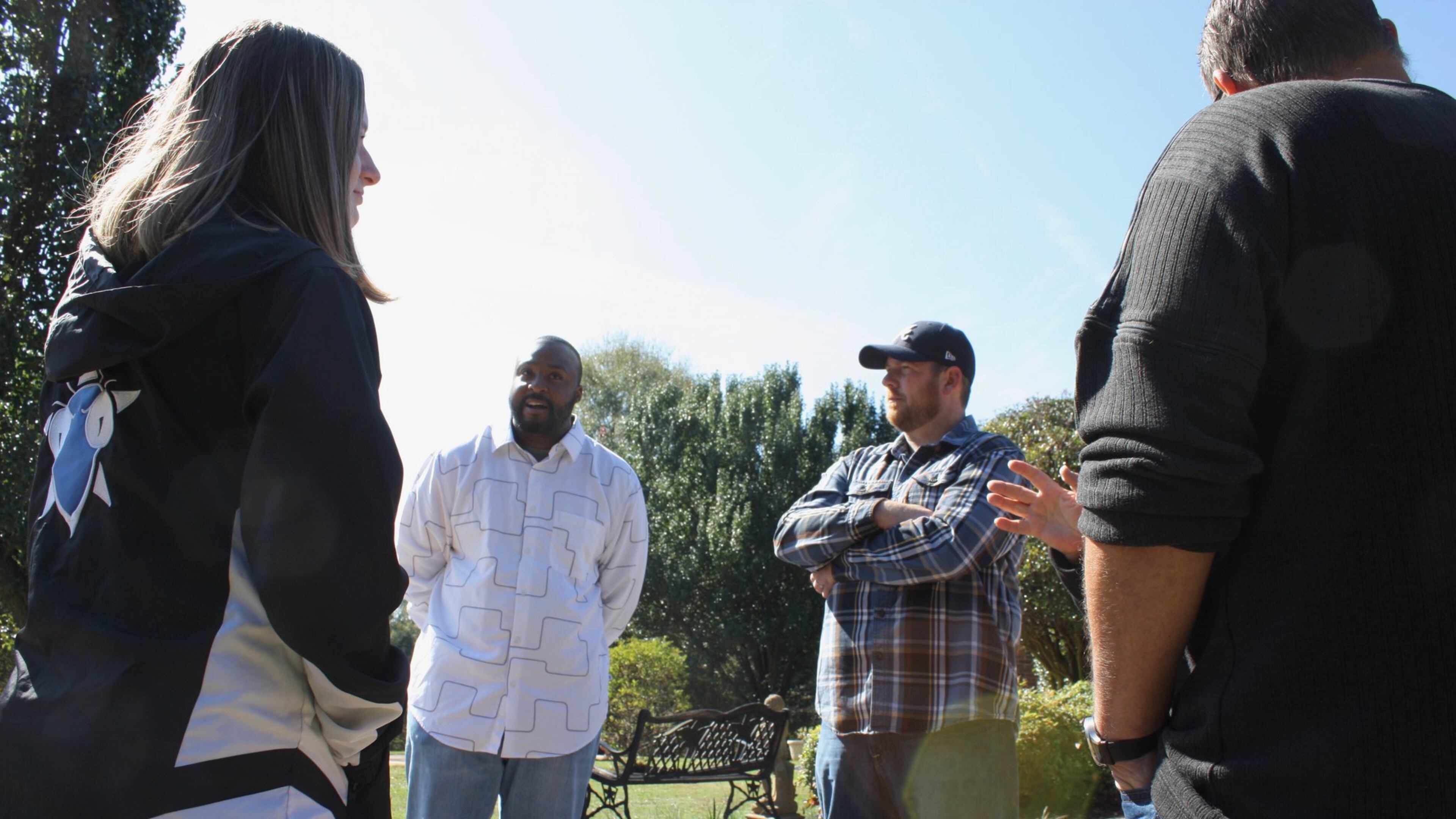 Hoschton City Council candidates Shantwon Astin (left) and Adam Ledbetter (right) talk to voters at a meet and greet Saturday, Nov. 2, 2019. Astin and Ledbetter, decided to run for office after an AJC investigation into racially divisive actions and comments by Mayor Theresa Kenerly and Mayor Pro Temp Jim Cleveland thrust the north metro city into the national limelight. CHRIS JOYNER / CJOYNER@AJC.COM
