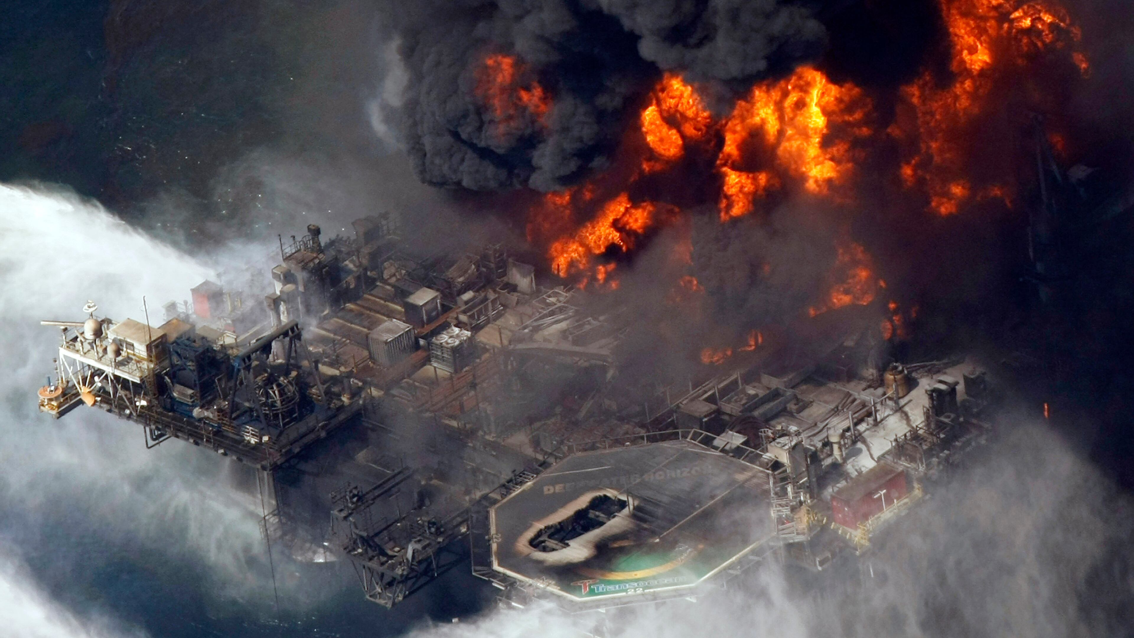 FILE - The Deepwater Horizon oil rig burns on April 21, 2010, in the Gulf of Mexico, more than 50 miles southeast of Venice, La. (AP Photo/Gerald Herbert, File)
