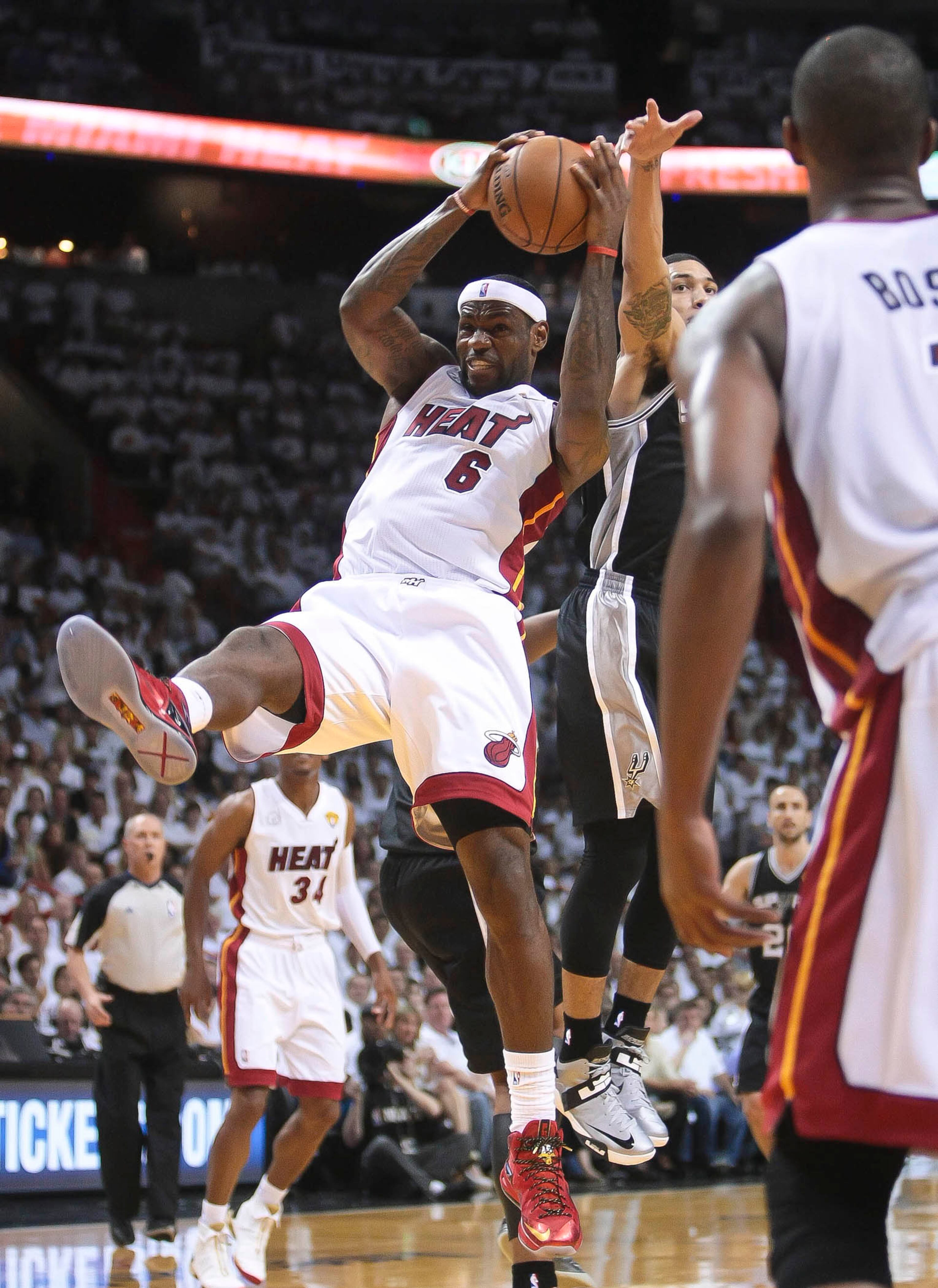 Miami Heat small forward LeBron James (6), pulls down a rebound during first quarter action of game one of the NBA finals between the Miami Heat and the San Antonio Spurs Thursday June 06, 2013, at American Airlines Arena in Miami.(Bill Ingram/Palm Beach Post)