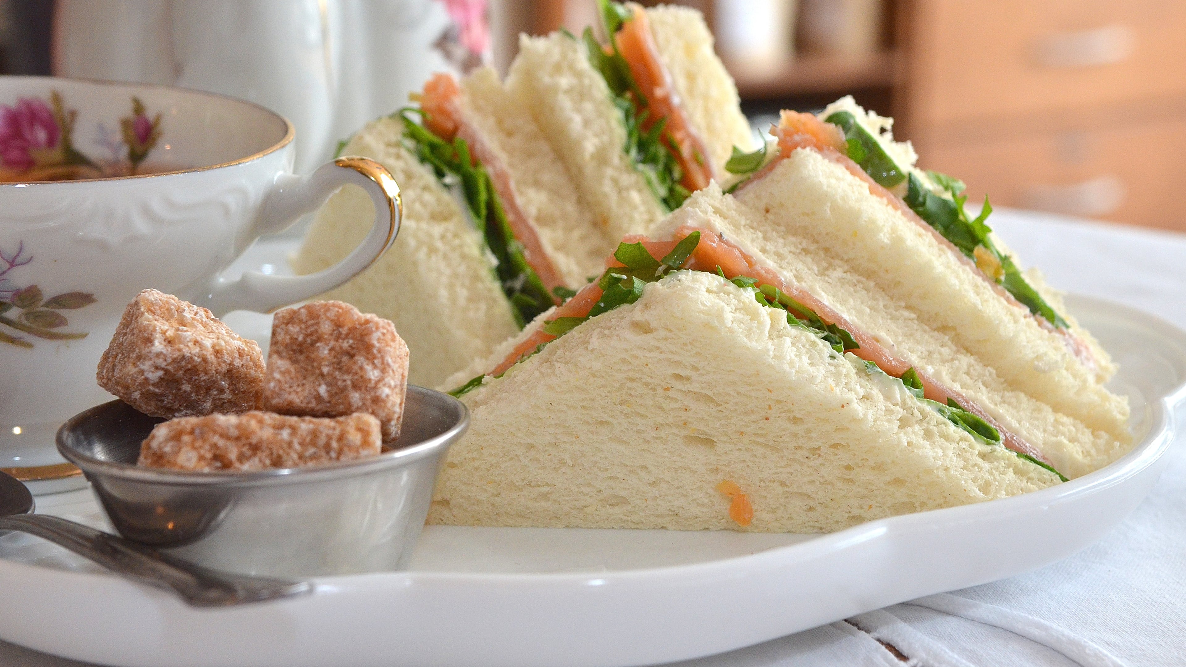 At Tipple & Rose Tea Parlor and Apothecary, tea time is not only for tea but also a smoked salmon and homemade boursin, with watercress (or arugula) sandwich. (Photo Chris Hunt/Special)