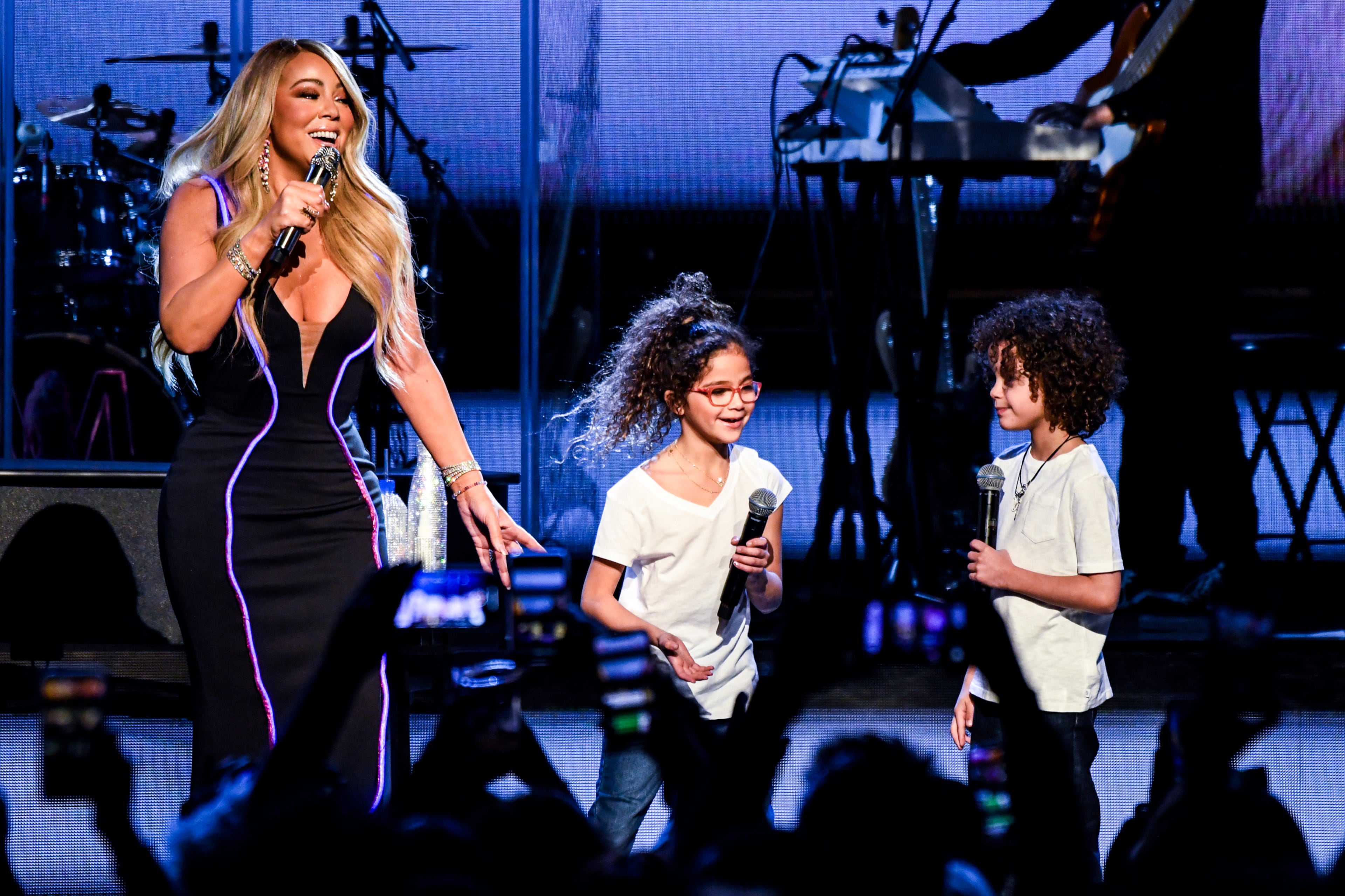 Mariah Carey performs onstage with Monroe Cannon and Moroccan Cannon during the the Caution World Tour at Fox Theater on March 5, 2019 in Atlanta. (Photo by Kevin Mazur/Getty Images for Live Nation)