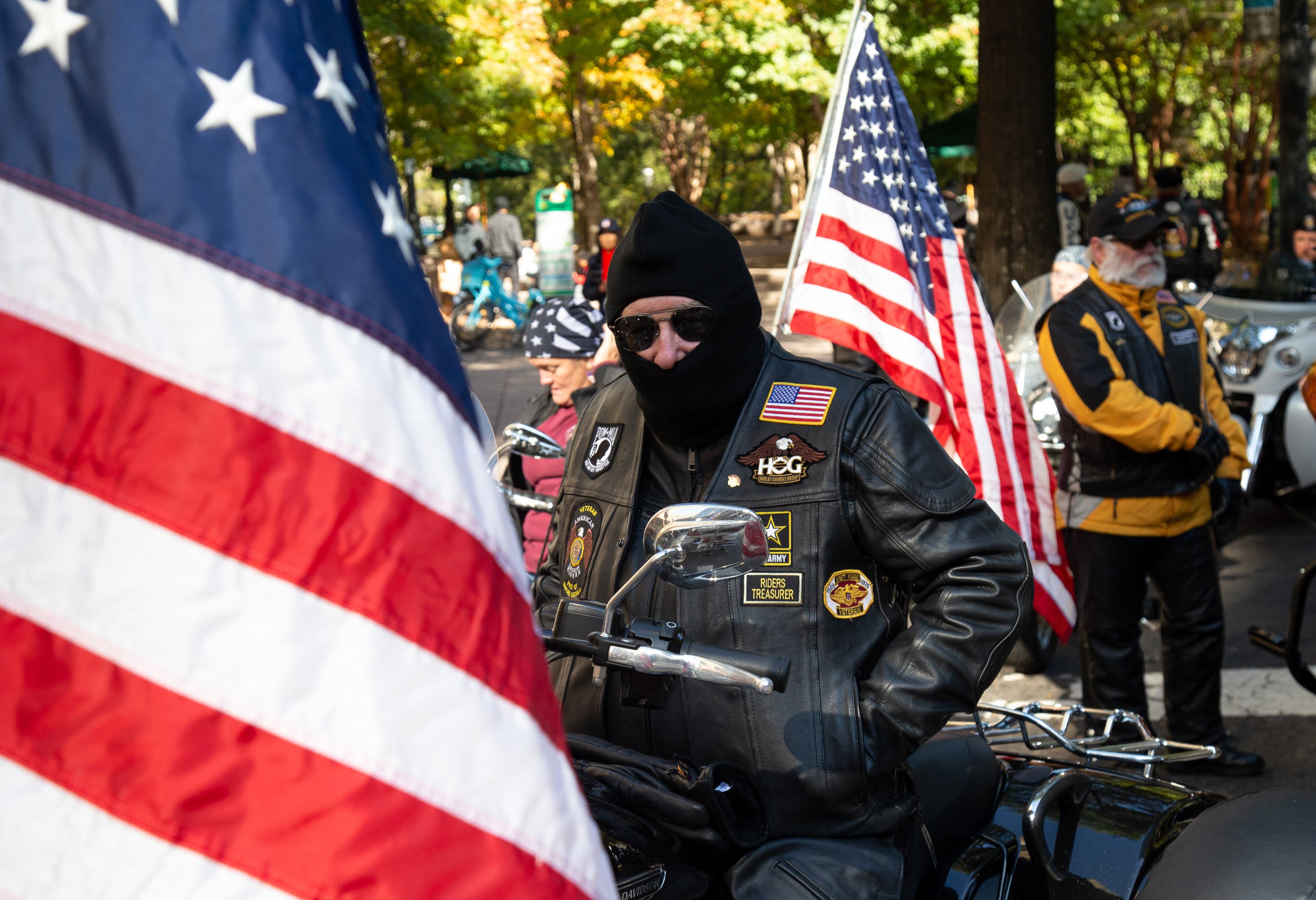 American Legion Riders member Gary Evans tries to stay warm before the start of the 38th annual Atlanta Veterans Day Parade on Saturday in Atlanta, November 9, 2019. STEVE SCHAEFER / SPECIAL TO THE AJC