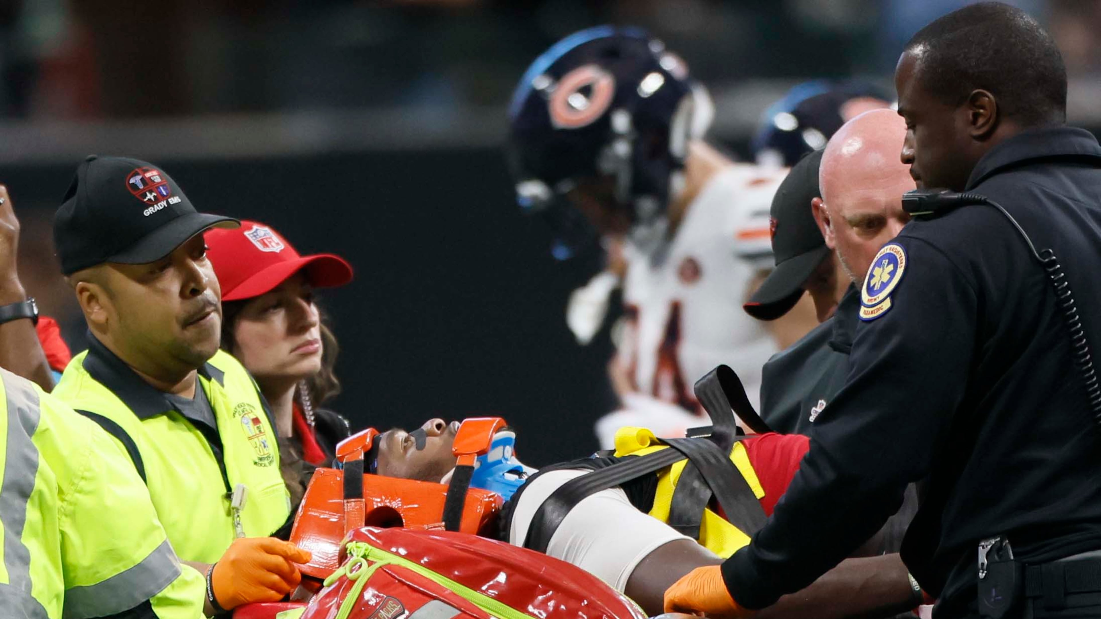 Atlanta Falcons linebacker Kendal Daniels is moved off the field on a stretcher as he receives medical attention from the medical staff after an injury in the second half of an NFL game against the Chicago Bears at Mercedes-Benz Stadium in Atlanta, GA, on Sunday, Oct. 18, 2026.
(Miguel Martinez/AJC)