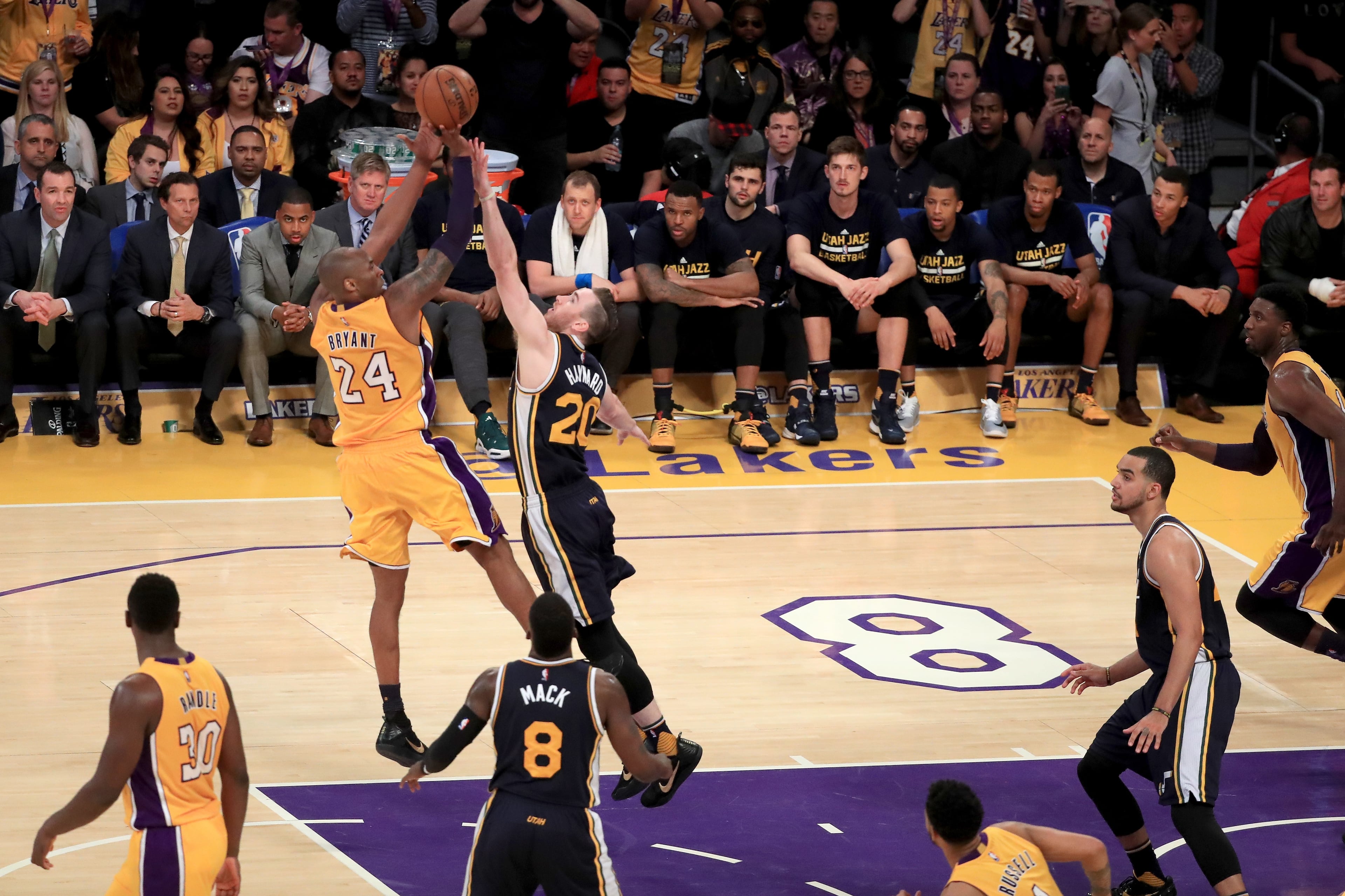 Kobe Bryant #24 of the Los Angeles Lakers shoots over Gordon Hayward #20 of the Utah Jazz in the second half at Staples Center on April 13, 2016 in Los Angeles, California. (Photo by Sean M. Haffey/Getty Images)