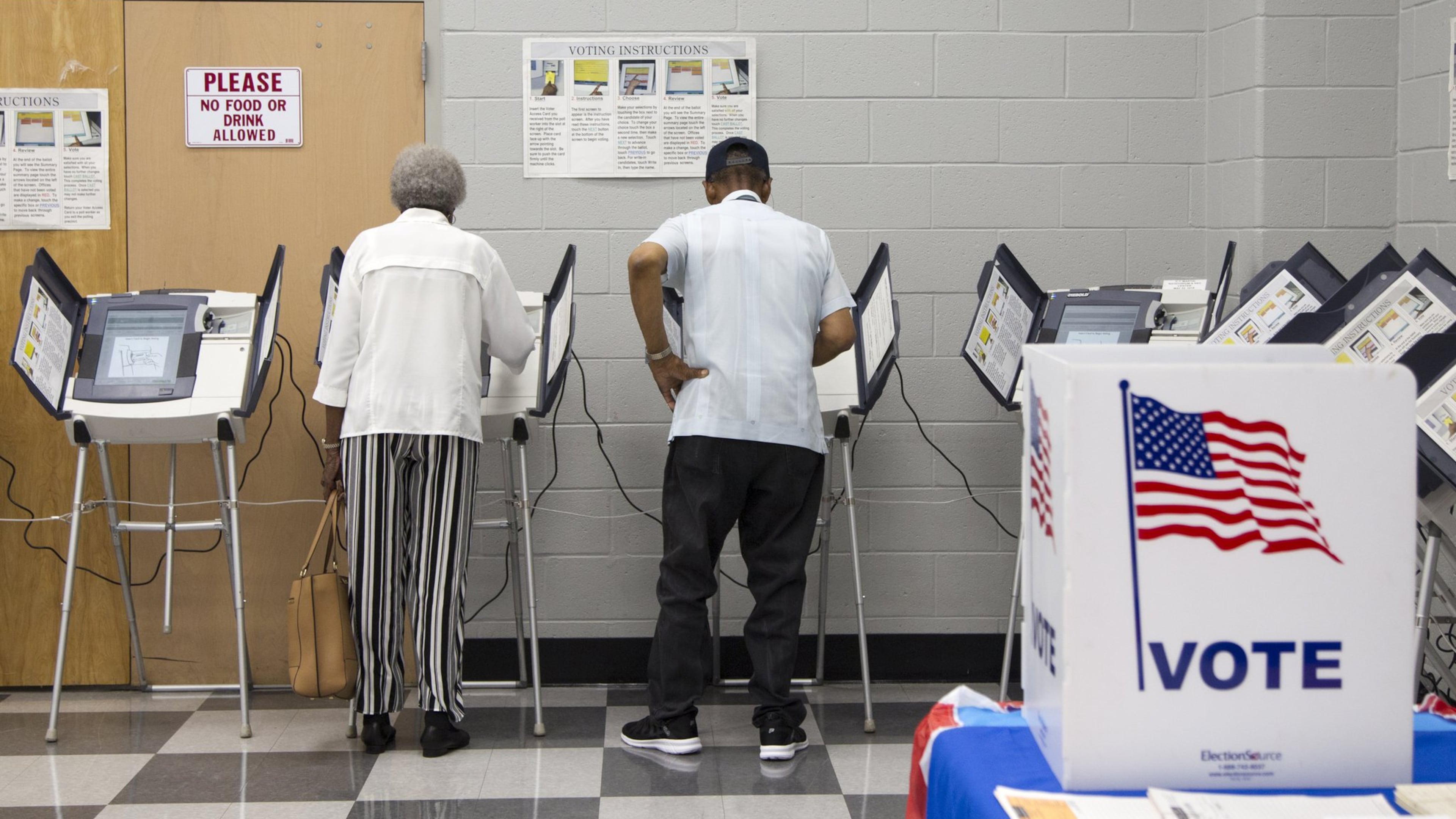People cast their vote during Saturday early voting for Georgia’s May primary at the C.T. Martin Natatorium and Recreation Center in Atlanta. (REANN HUBER/REANN.HUBER@AJC.COM)