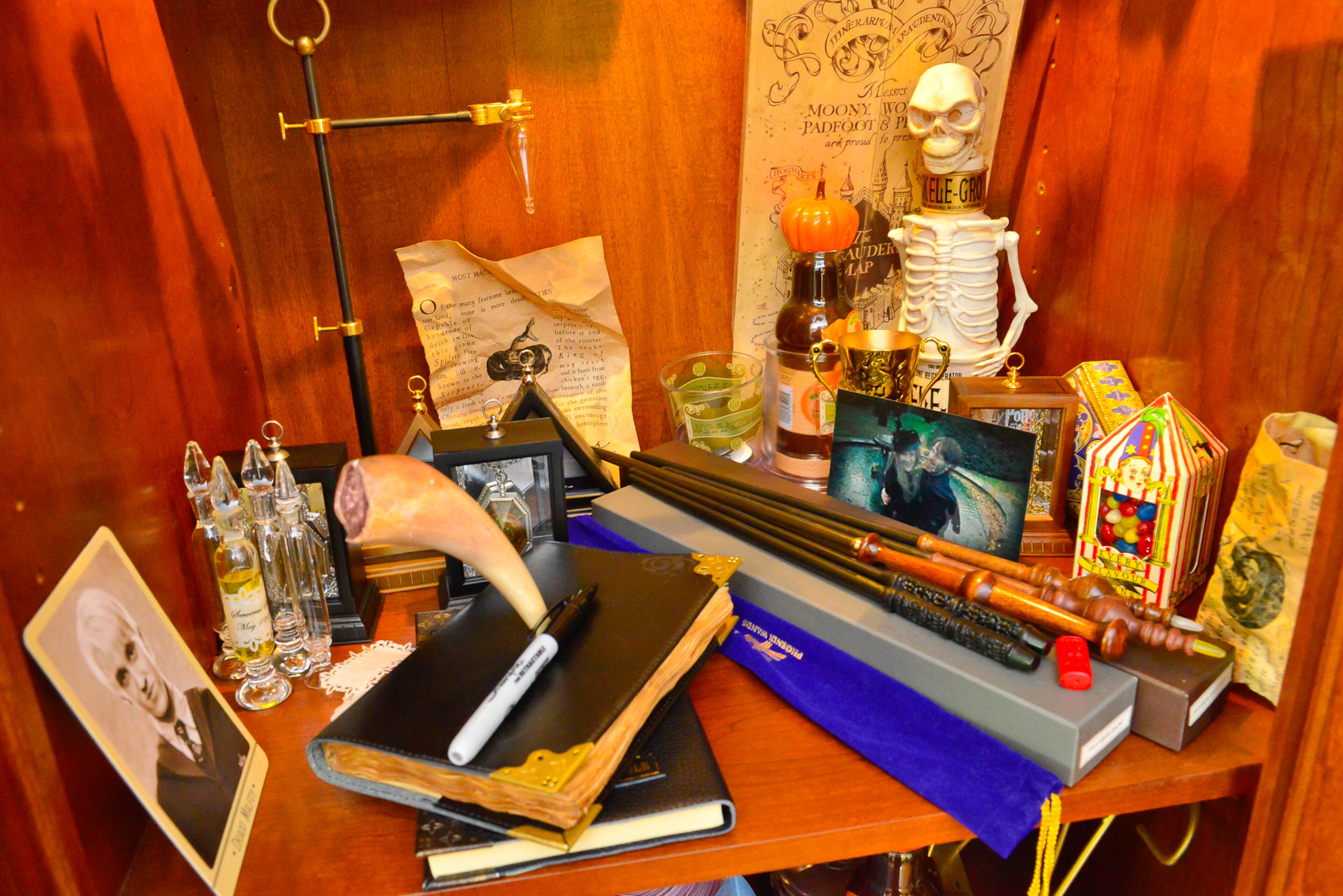 The Dufanos say their home is known in the neighborhood as the "Harry Potter" house, attracting nearly 1,000 children during Halloween 2013. Inside the home, their collection of Potter paraphernalia, including wands and potion bottles, are on display.
