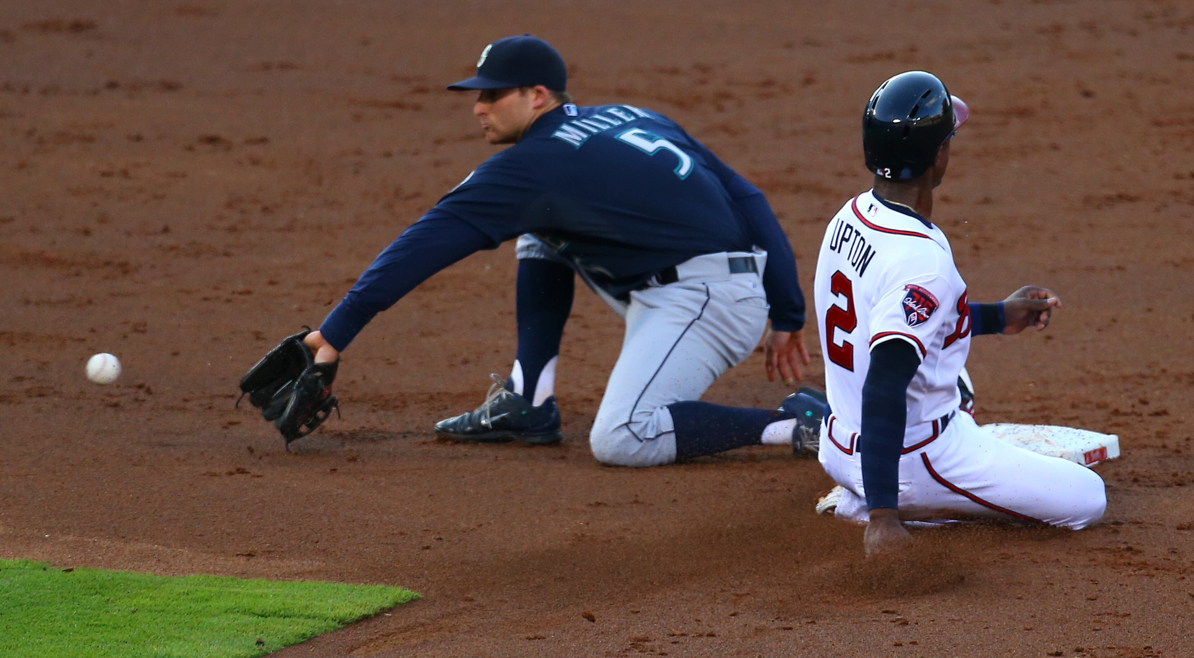 Braves B.J. Upton steals second base as the throw arrives late to Mariners Brad Miller during the first inning of a MLB game on Tuesday, June 3, 2014, in Atlanta. CURTIS COMPTON / CCOMPTON@AJC.COM
